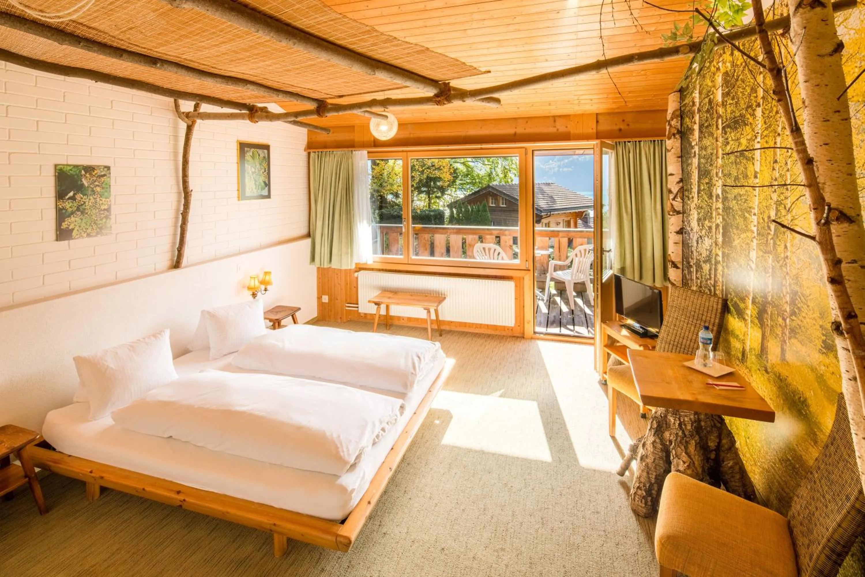 Photo of the whole room, Bed in Hotel Lindenhof by Crossworld AG