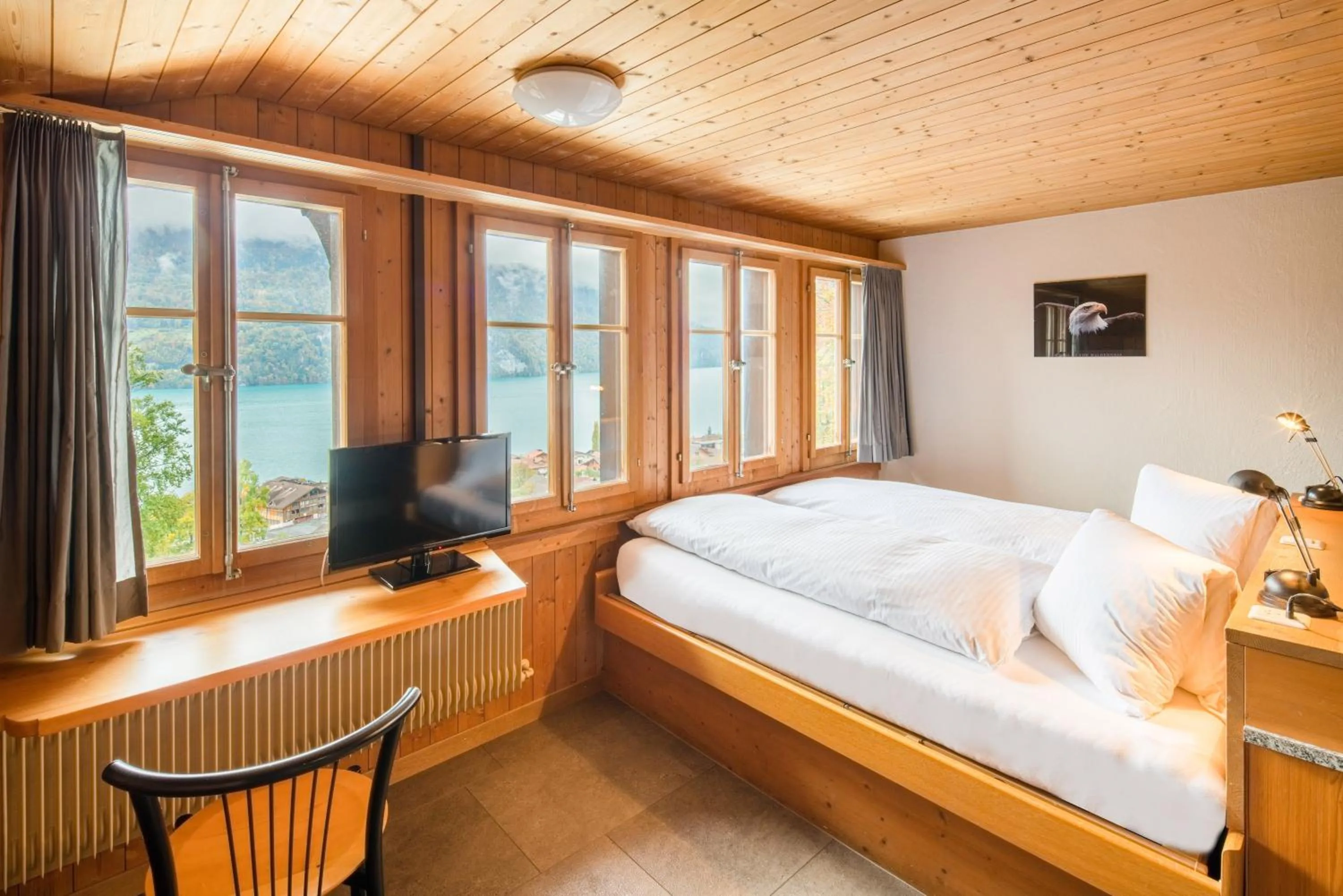 Photo of the whole room, Bed in Hotel Lindenhof by Crossworld AG