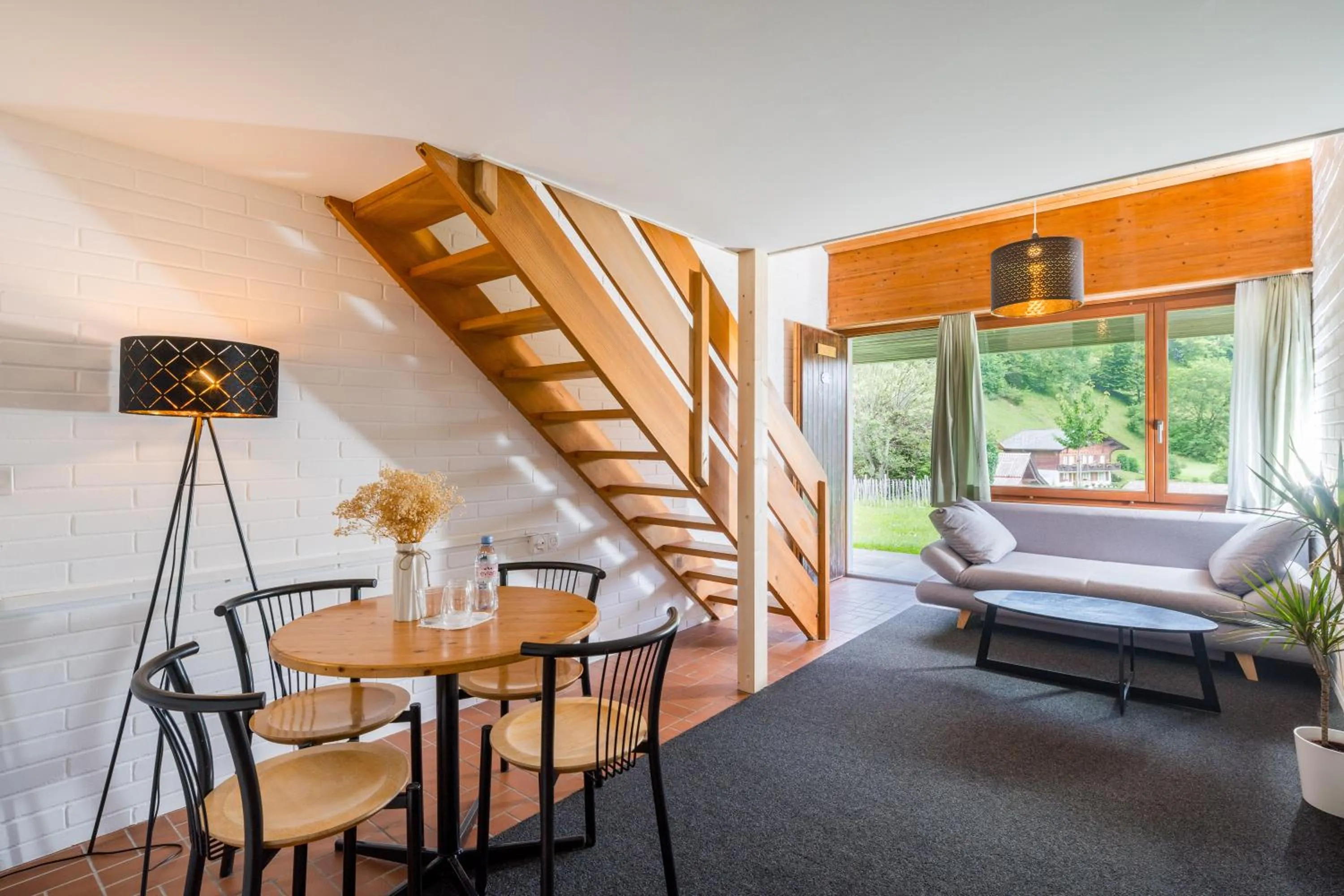 Living room in Hotel Lindenhof by Crossworld AG