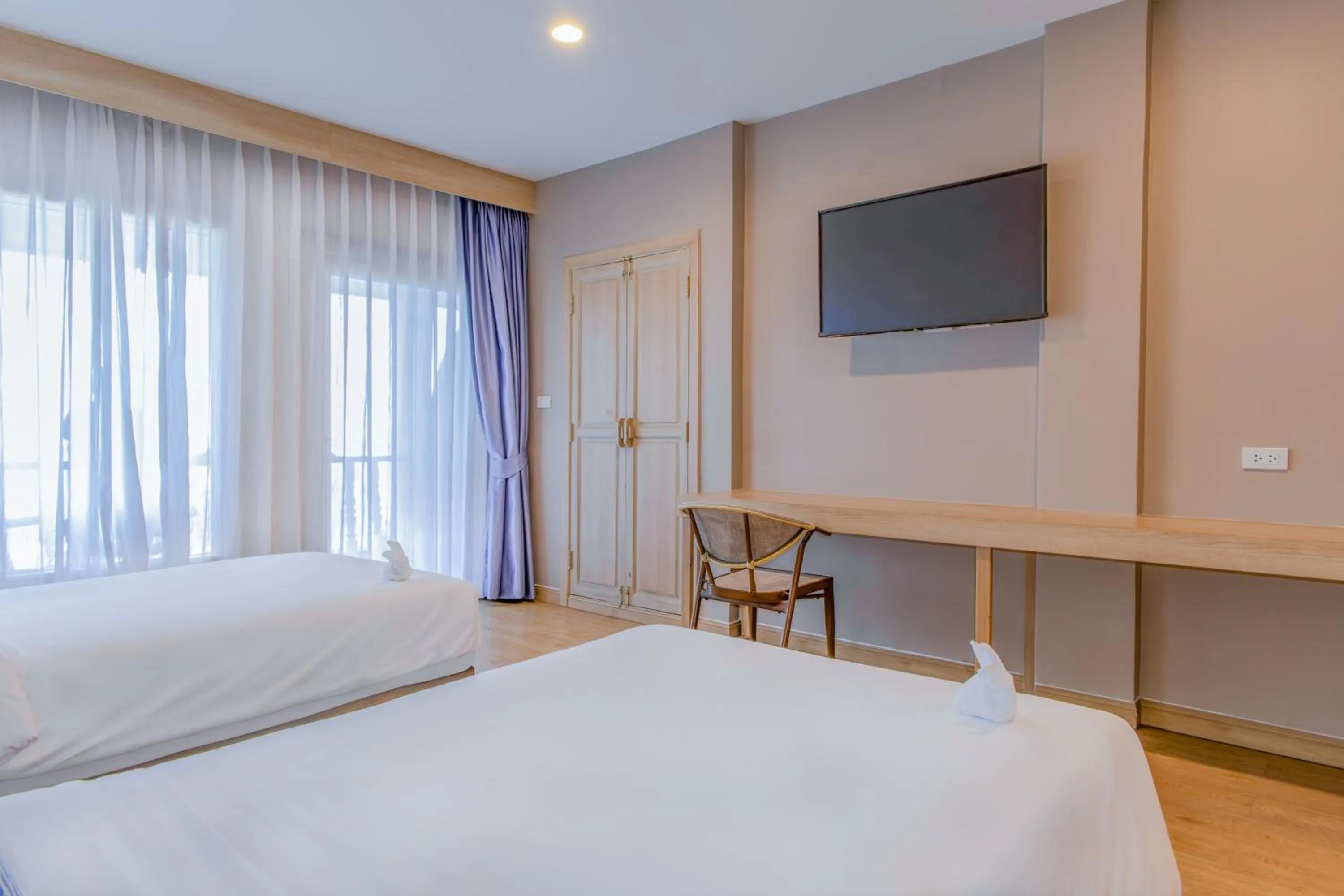 Bed in Namaka Resort Kamala