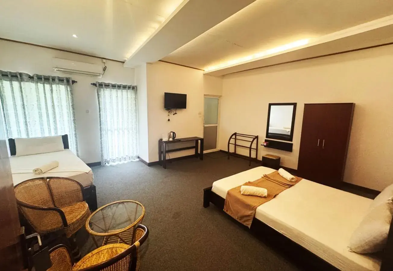 Luxury Triple Room in Nico Lagoon Hotel Luxury Triple Room in Nico Lagoon Hotel