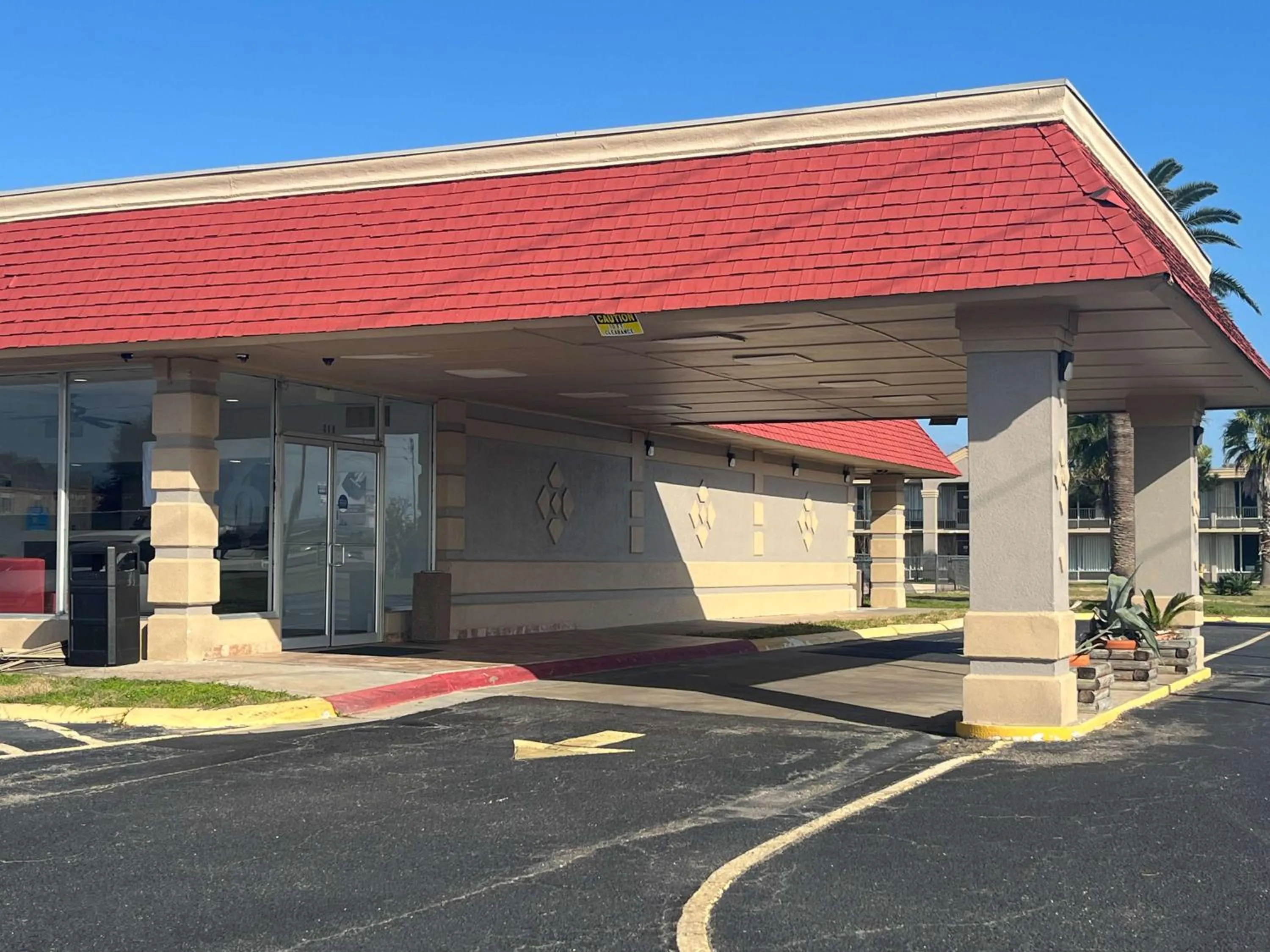 Property building in Super 8 by Wyndham Lake Jackson/Clute