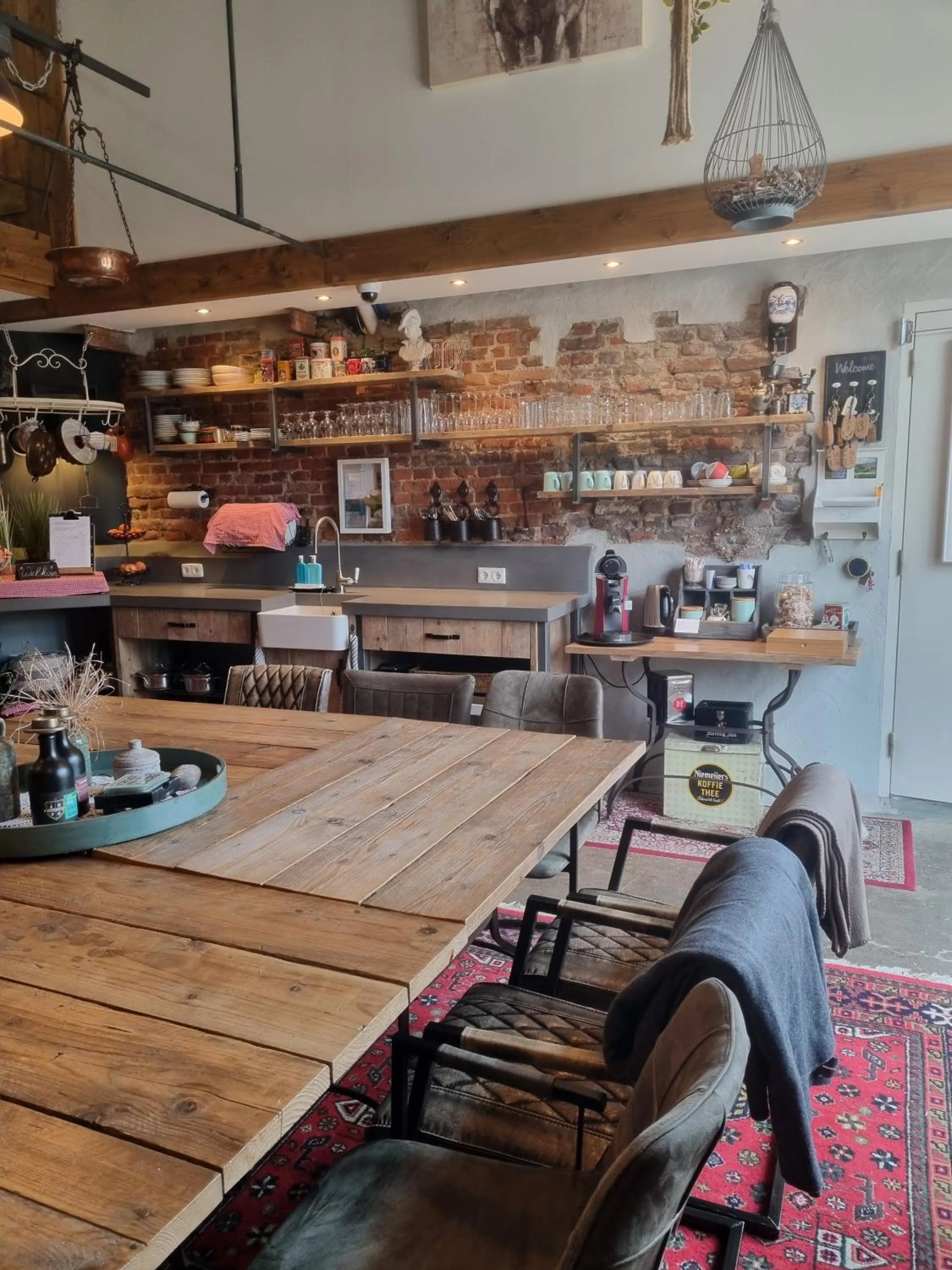 Communal lounge/ TV room in Bed & Breakfast aan de Beek