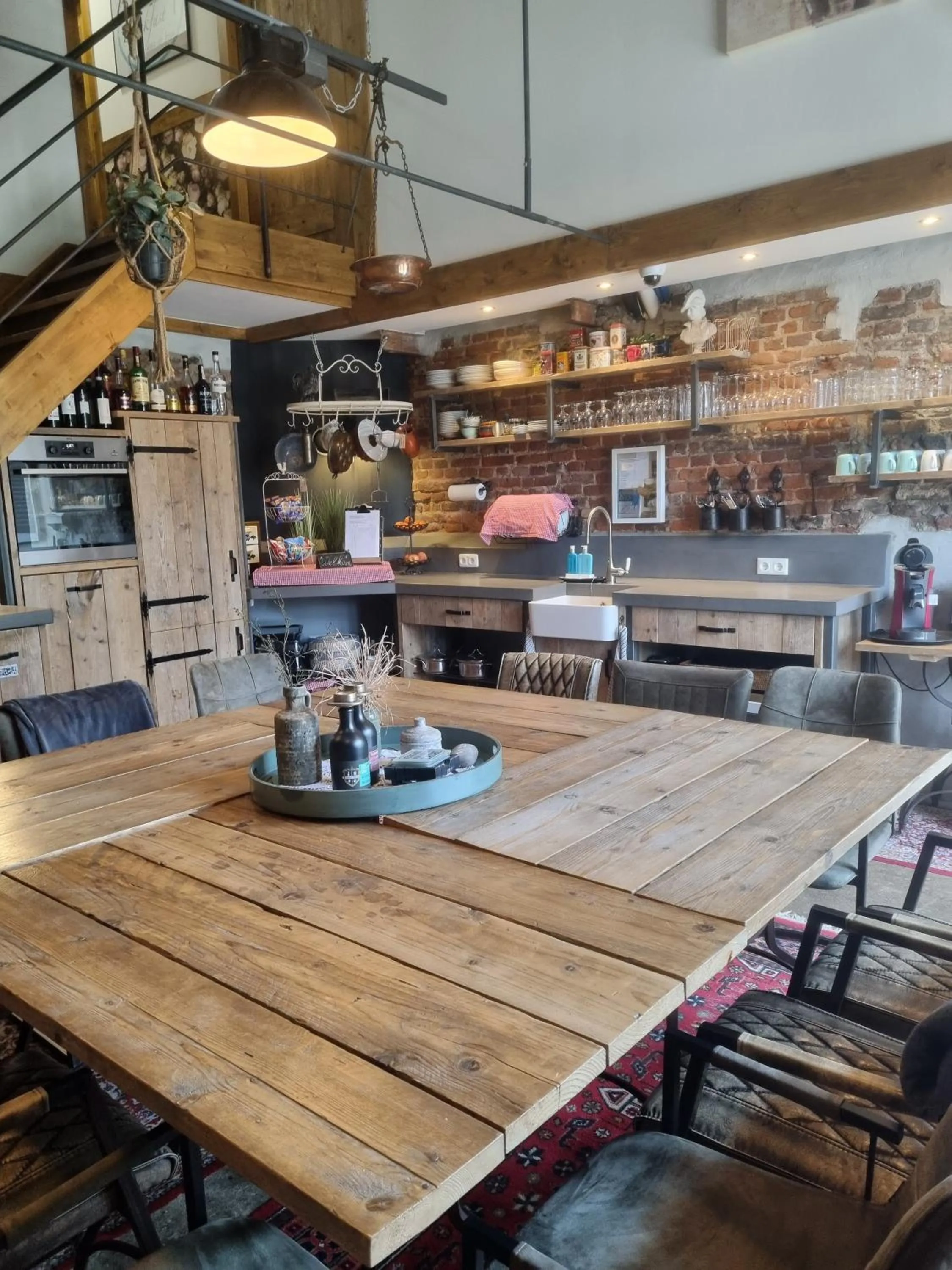 Communal lounge/ TV room in Bed & Breakfast aan de Beek