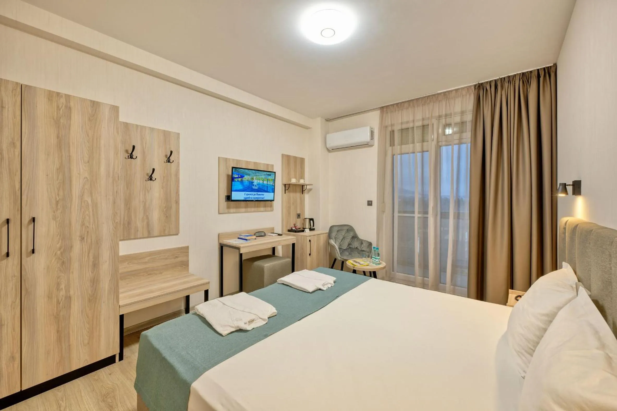 Bed in Augusta SPA Hotel