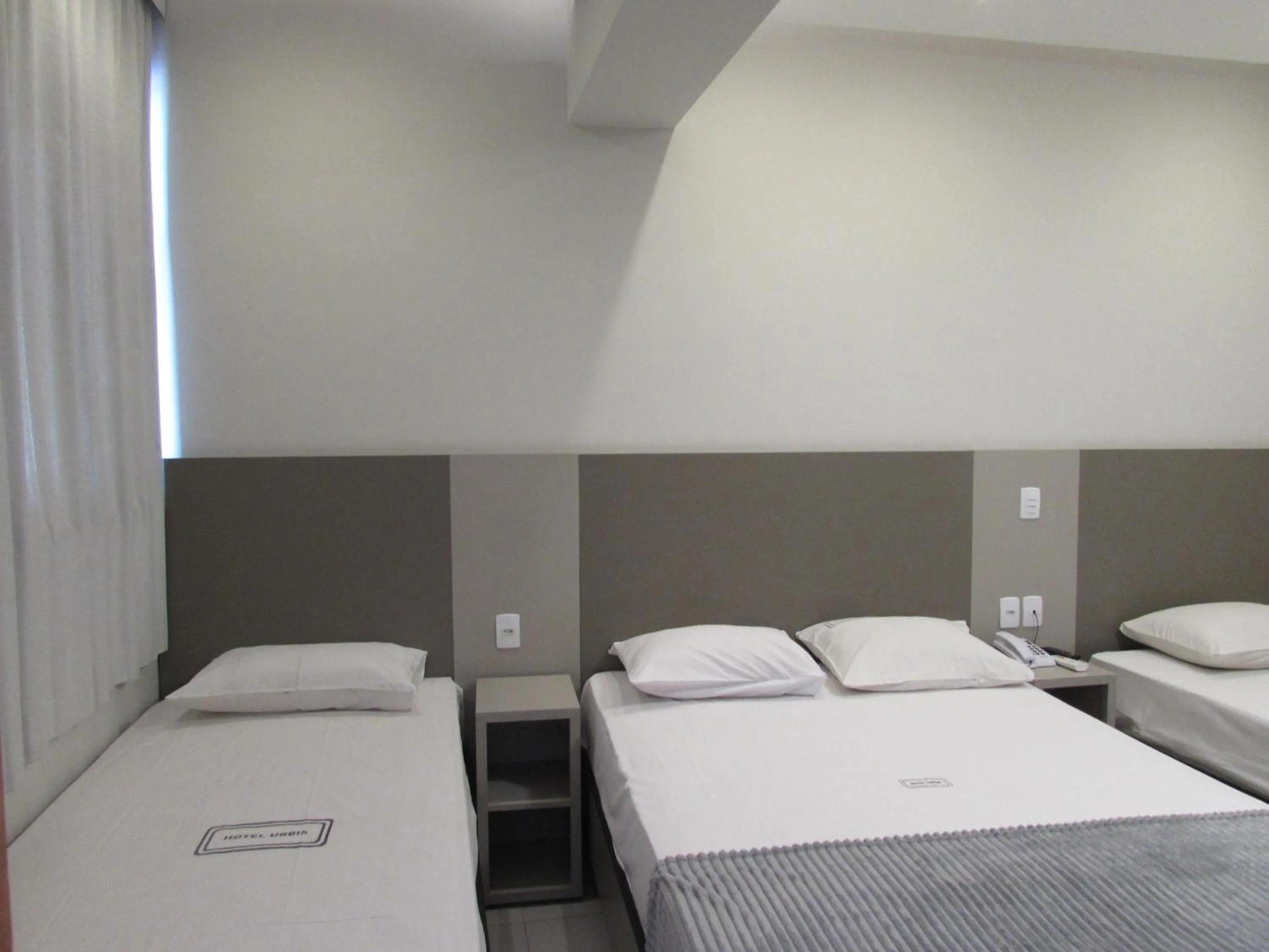 Bed in Hotel Urbis a 10 minutos Rua 25 de Março, Brás,Bom Retiro,a 2 minutos do Mirante Sampa Sky