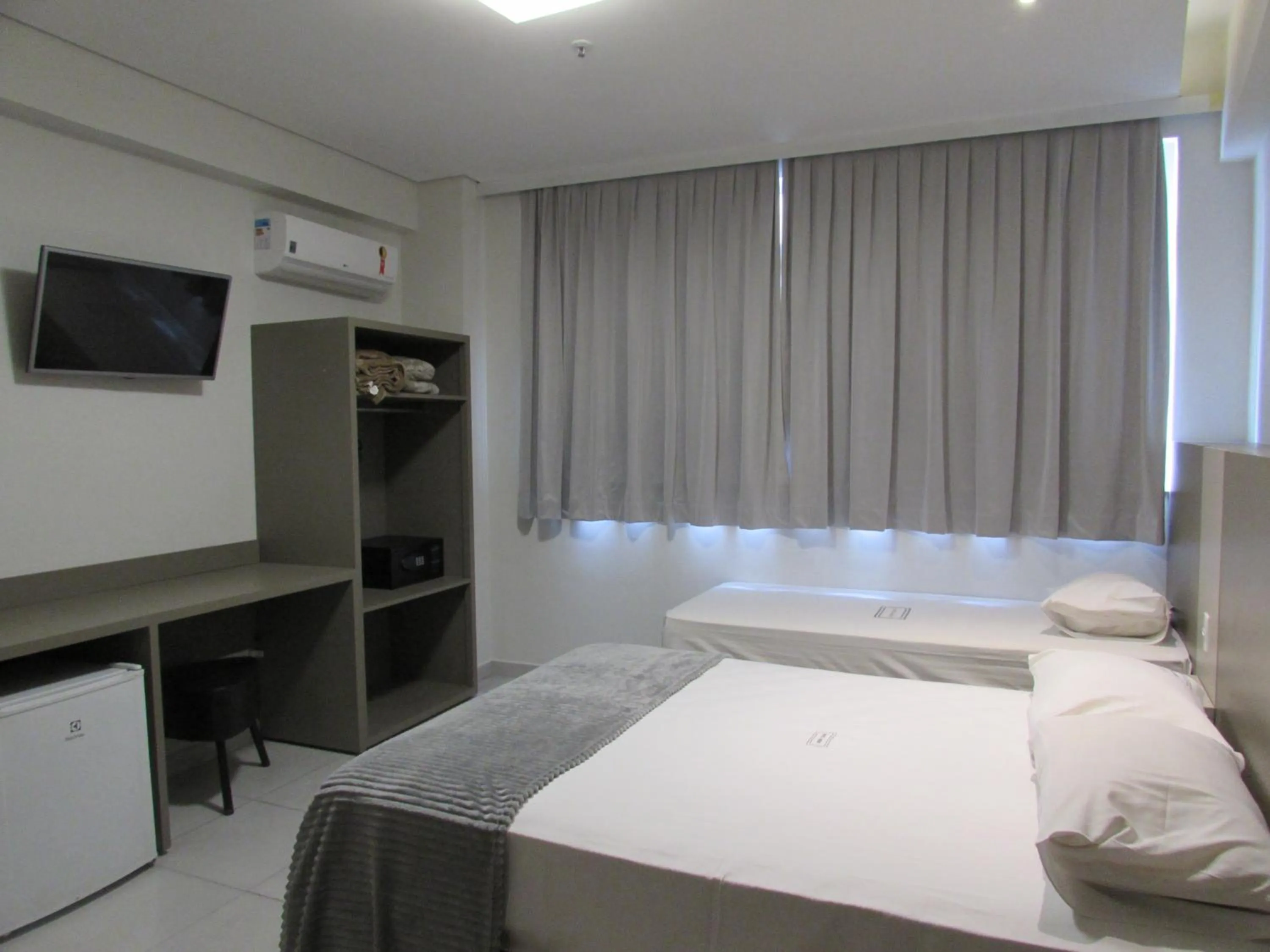 Bed in Hotel Urbis a 10 minutos Rua 25 de Março, Brás,Bom Retiro,a 2 minutos do Mirante Sampa Sky