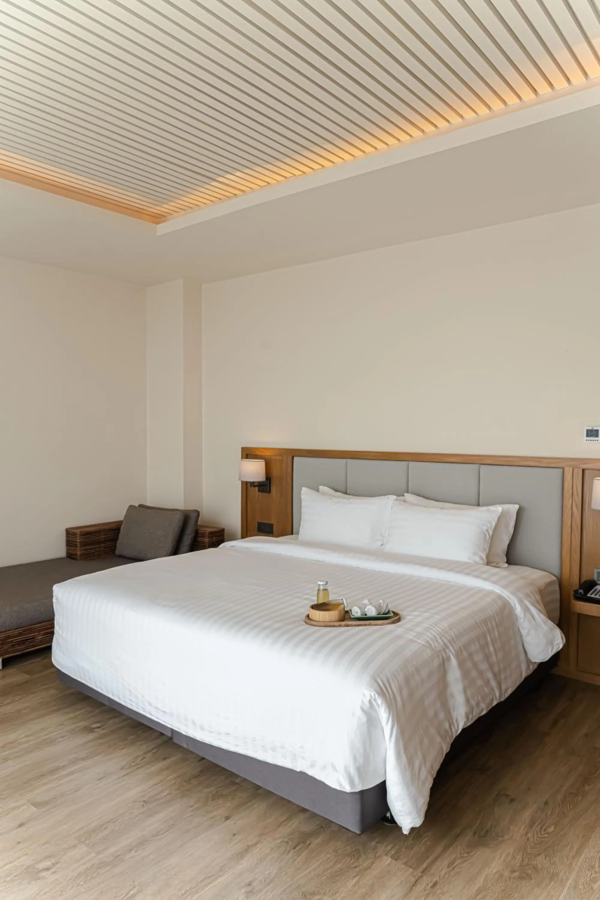 Bed in Baan Haad Ngam Boutique Resort