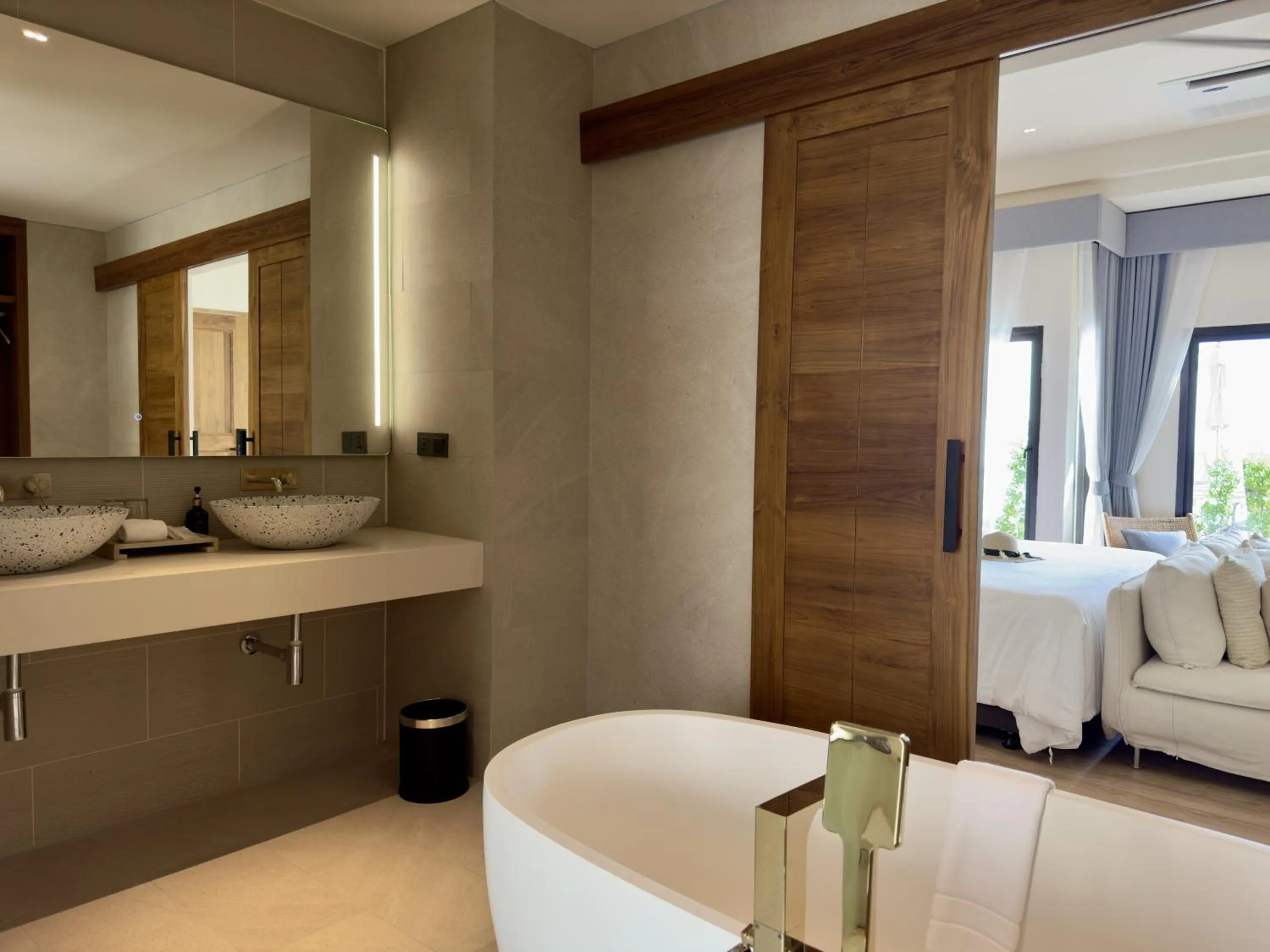 Bed in Baan Haad Ngam Boutique Resort