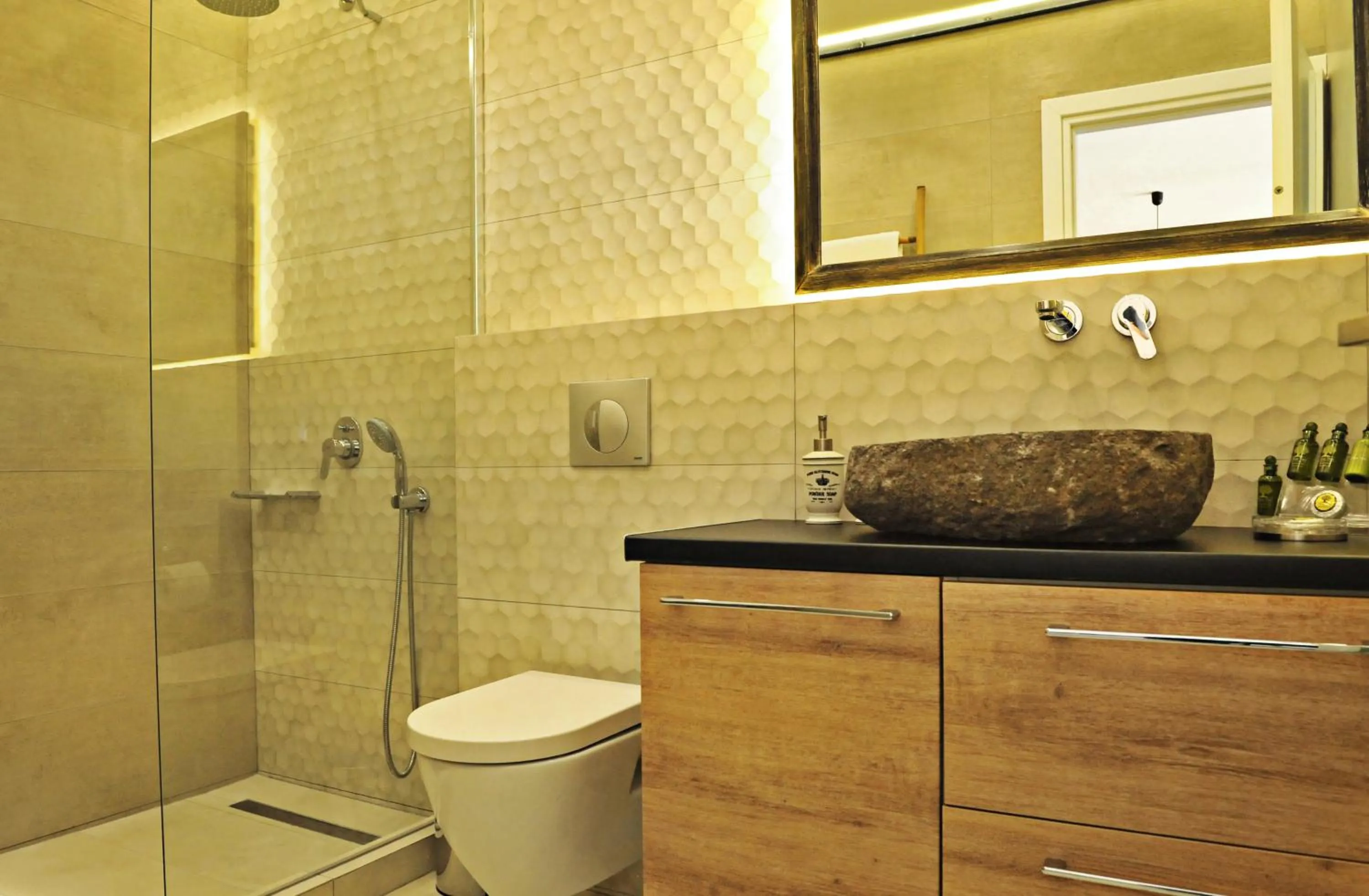 Shower in The Athenians Modern Apartments