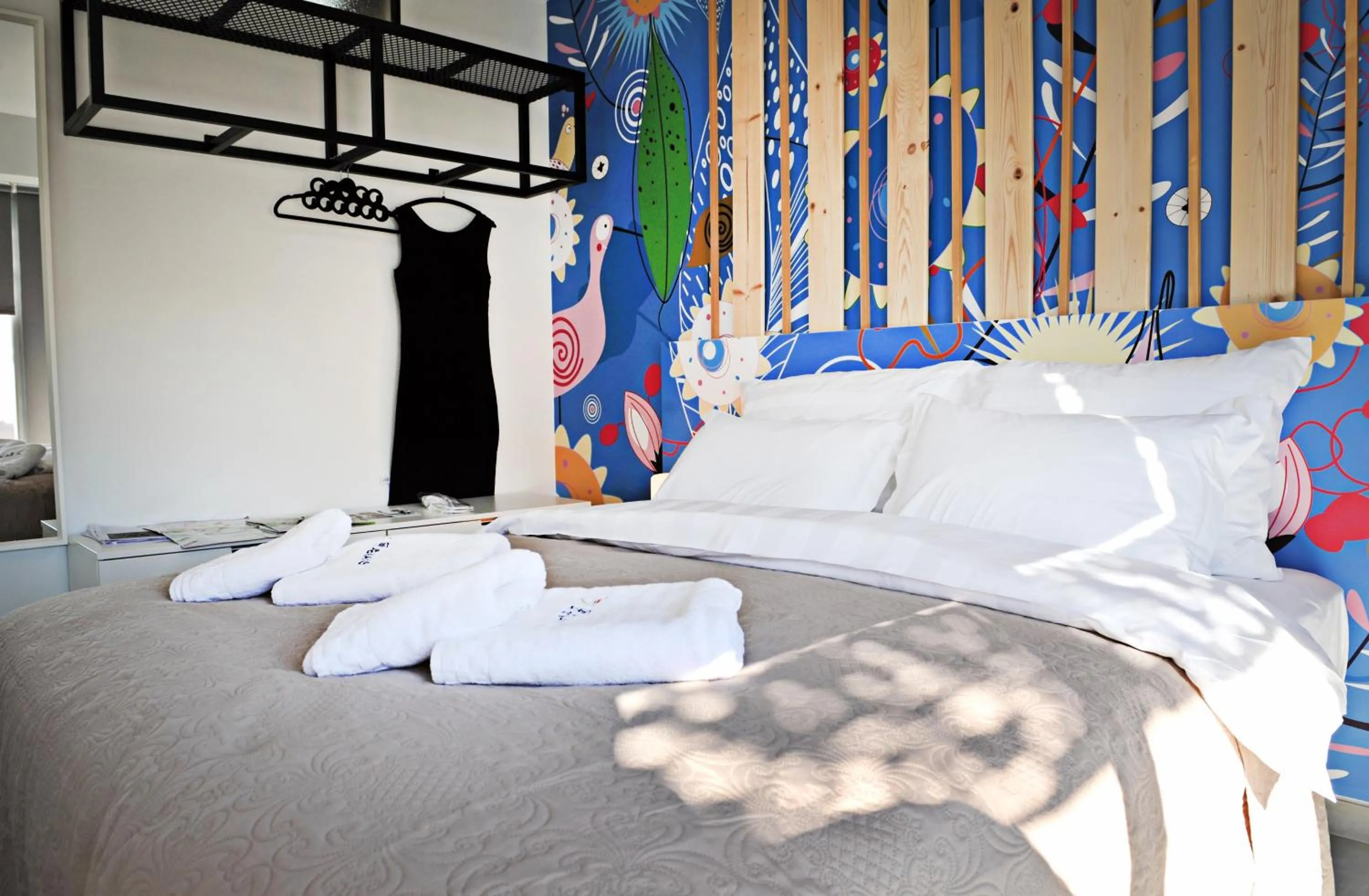 Bed in The Athenians Modern Apartments