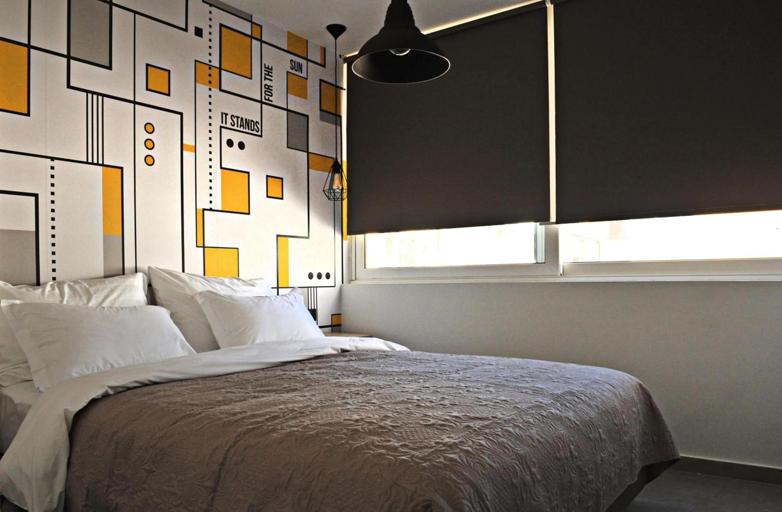 Bed in The Athenians Modern Apartments