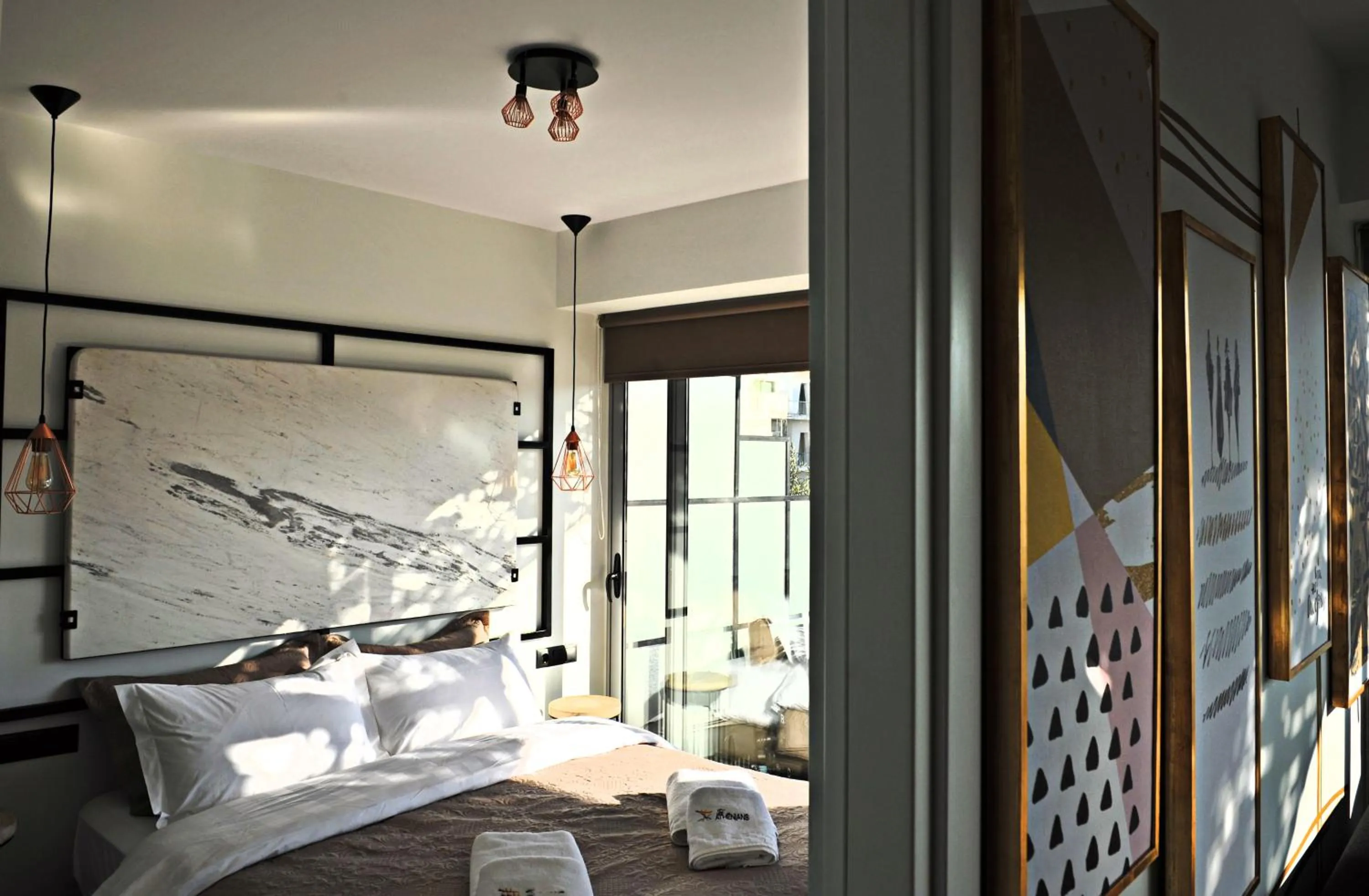 Bed in The Athenians Modern Apartments