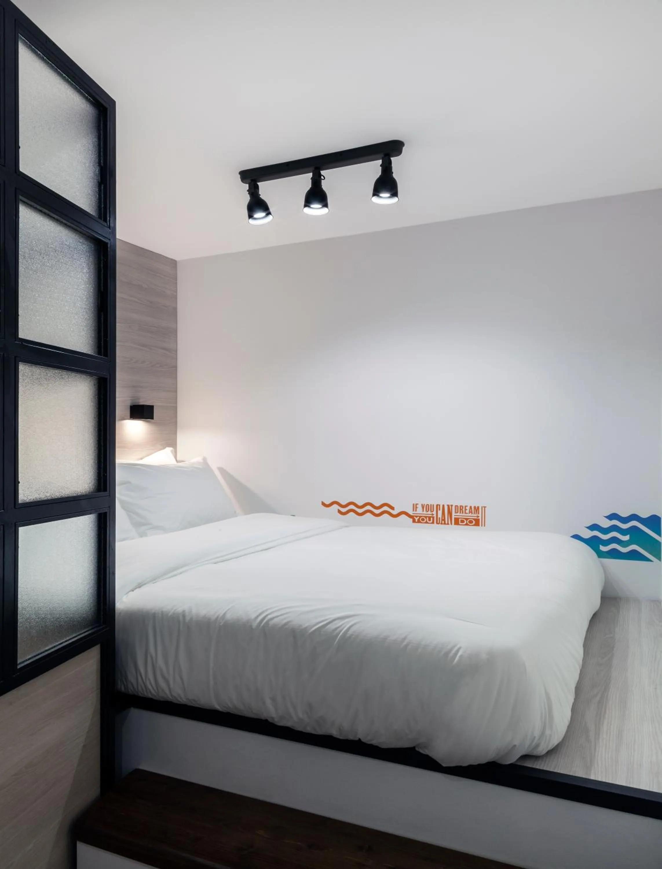 Bed in The Athenians Modern Apartments