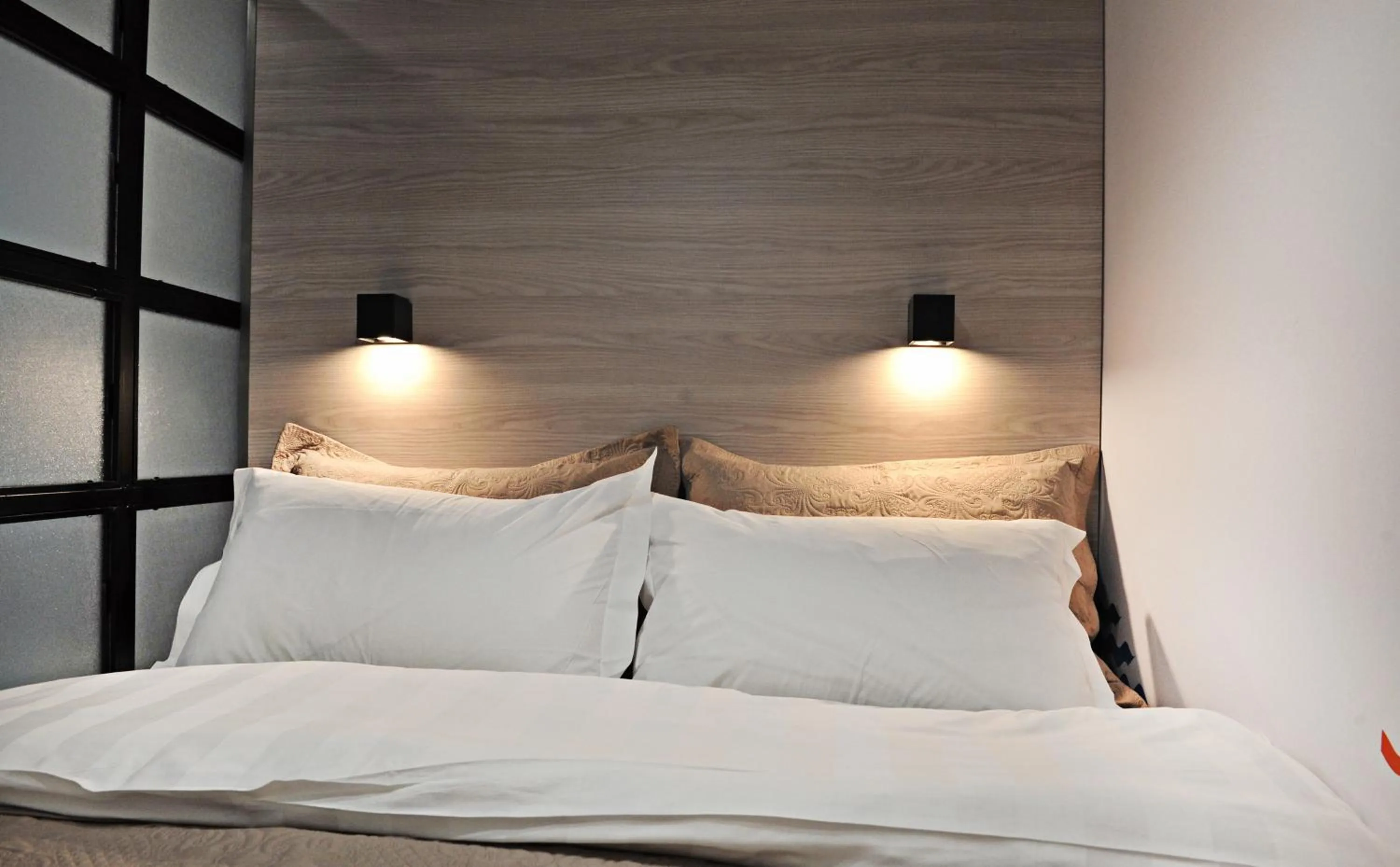 Bed in The Athenians Modern Apartments