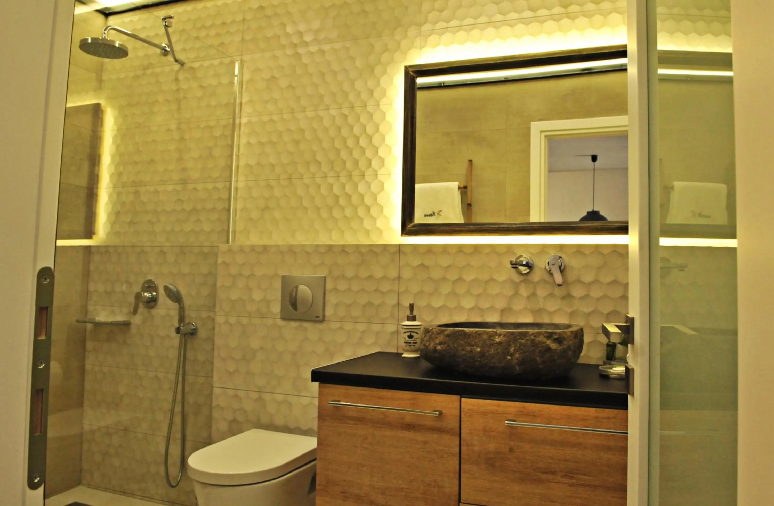 Shower in The Athenians Modern Apartments