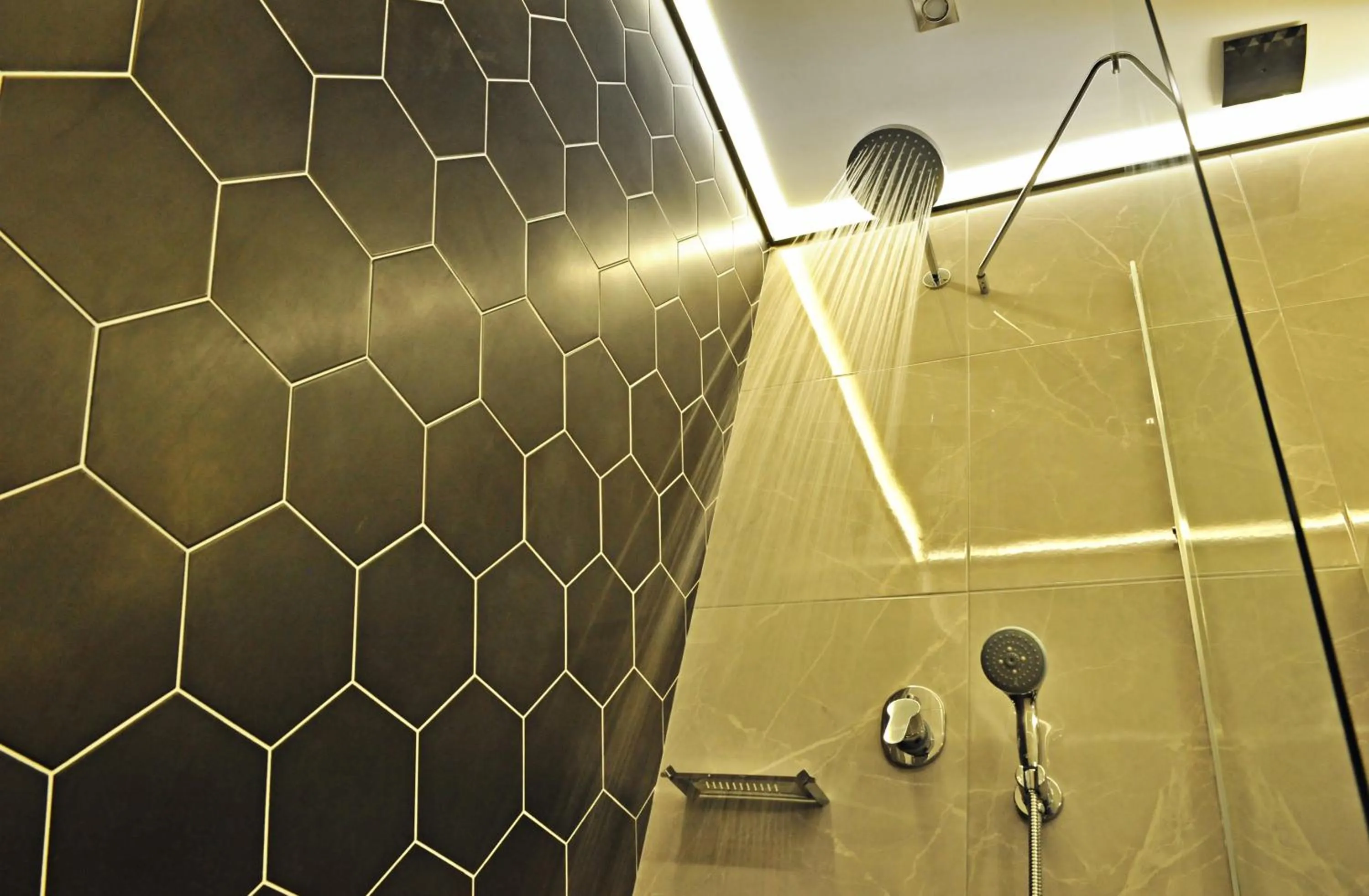 Shower in The Athenians Modern Apartments