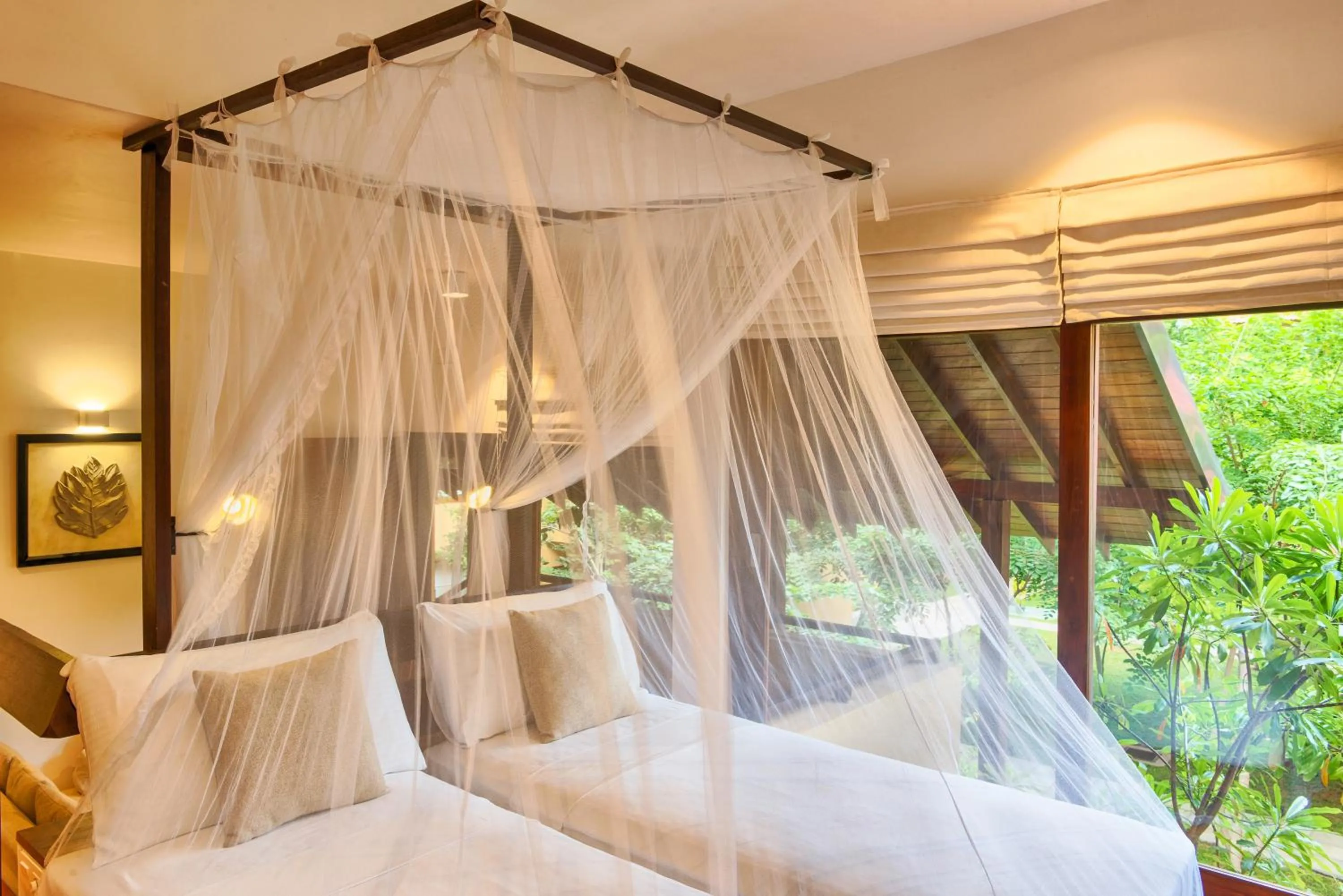 Bed in Jetwing Ayurveda Pavilions