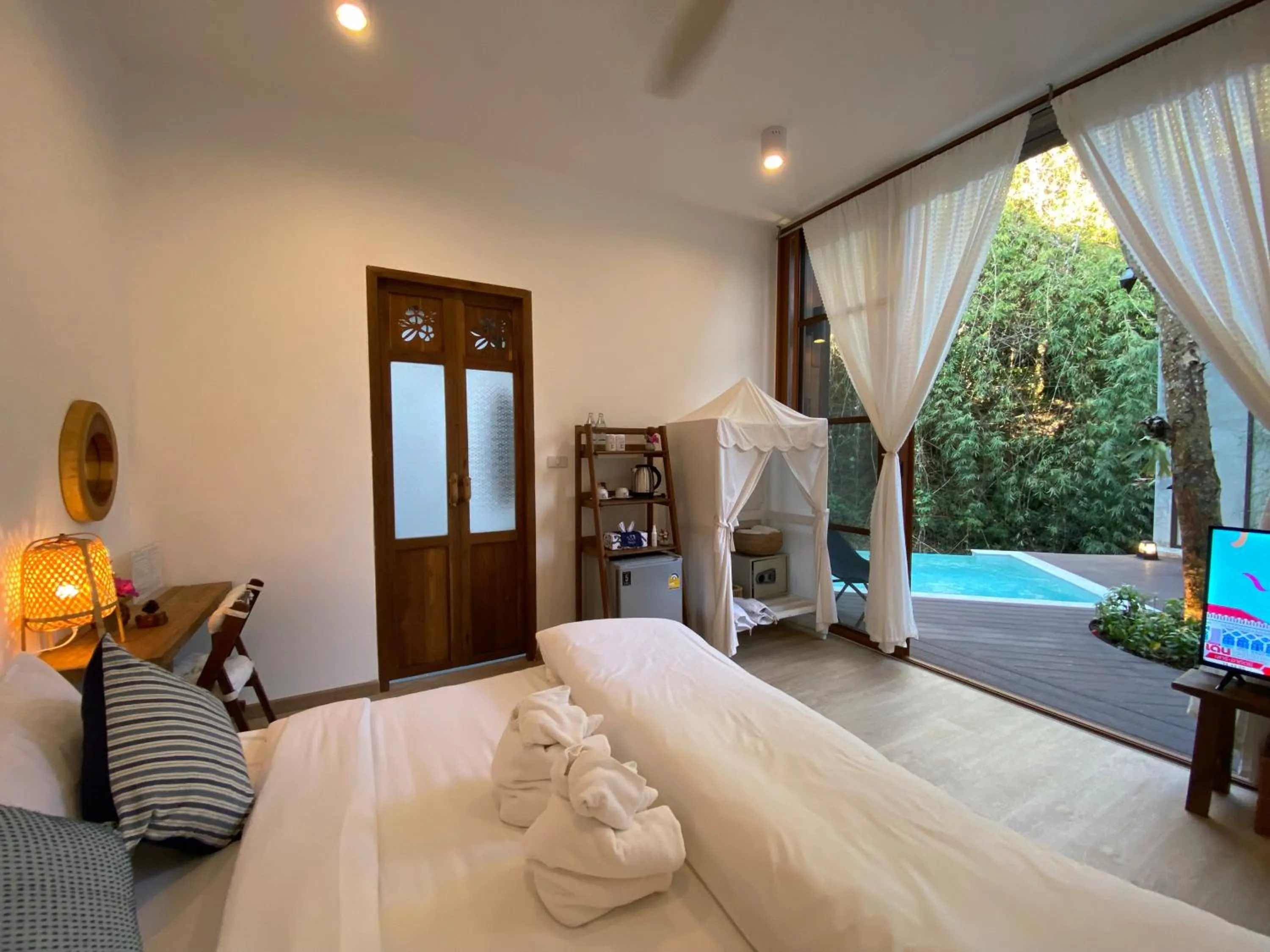 Bed in Proud Phu Fah Maerim Resort