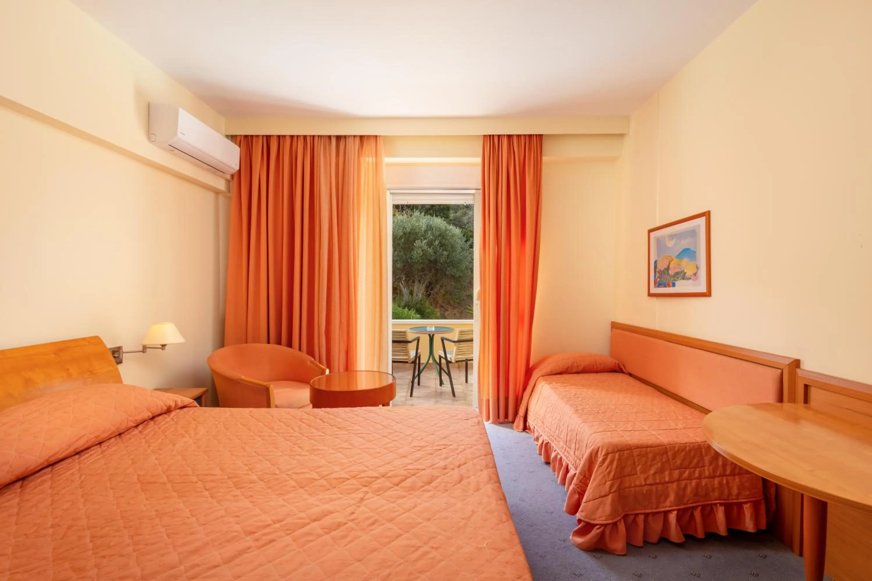 Bed in Crithoni's Paradise Hotel