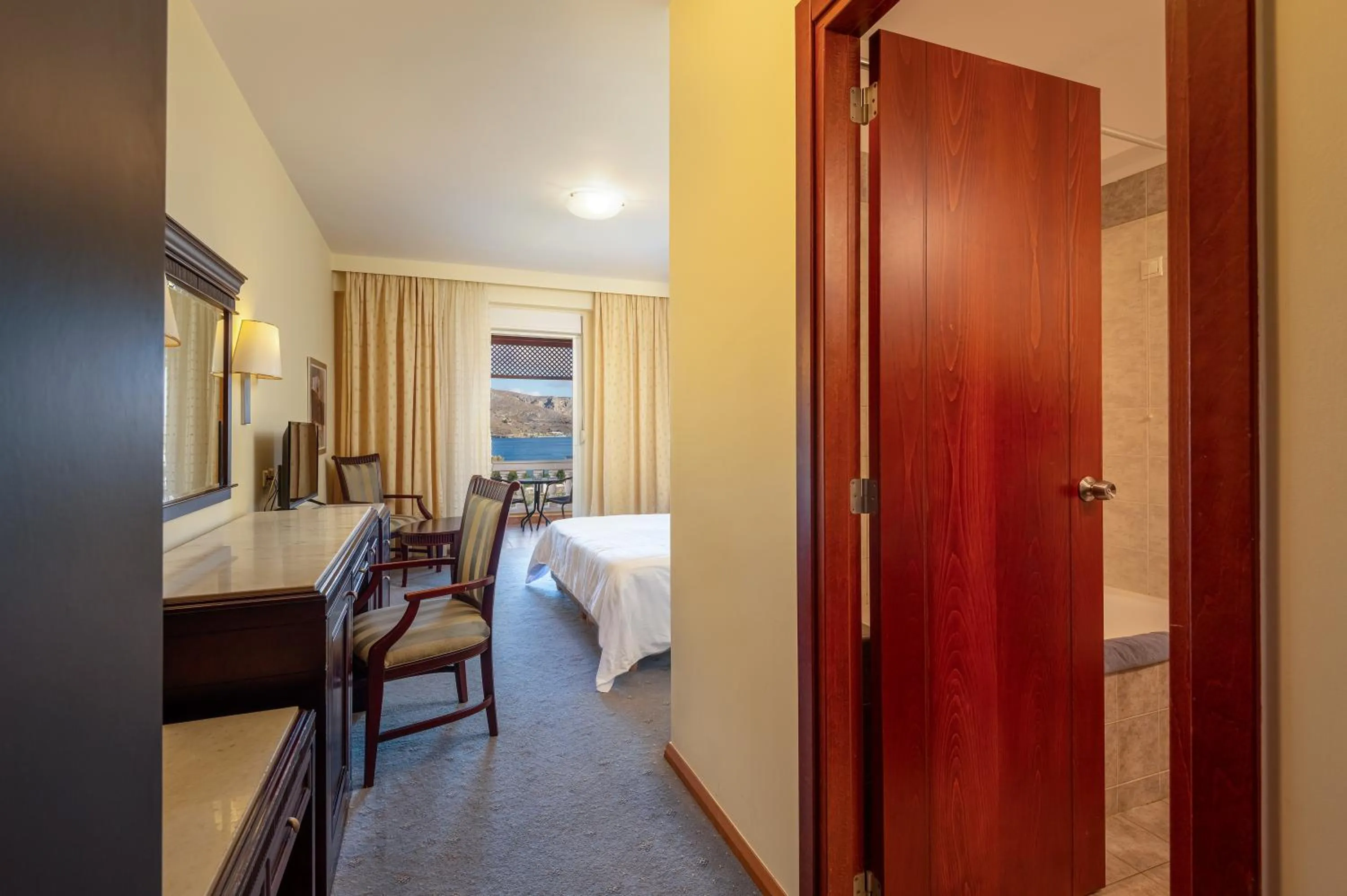 Bed in Crithoni's Paradise Hotel