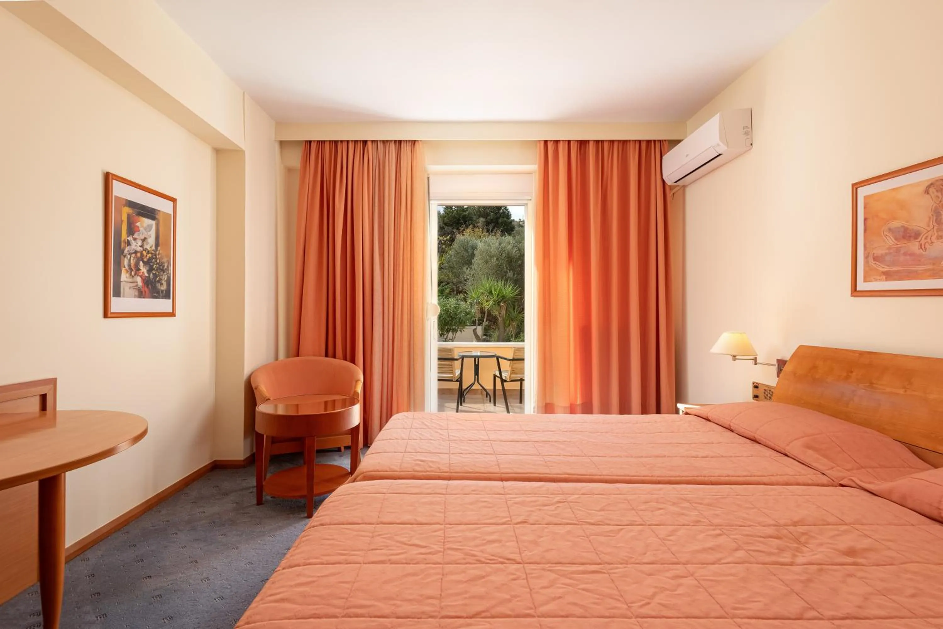 Bed in Crithoni's Paradise Hotel