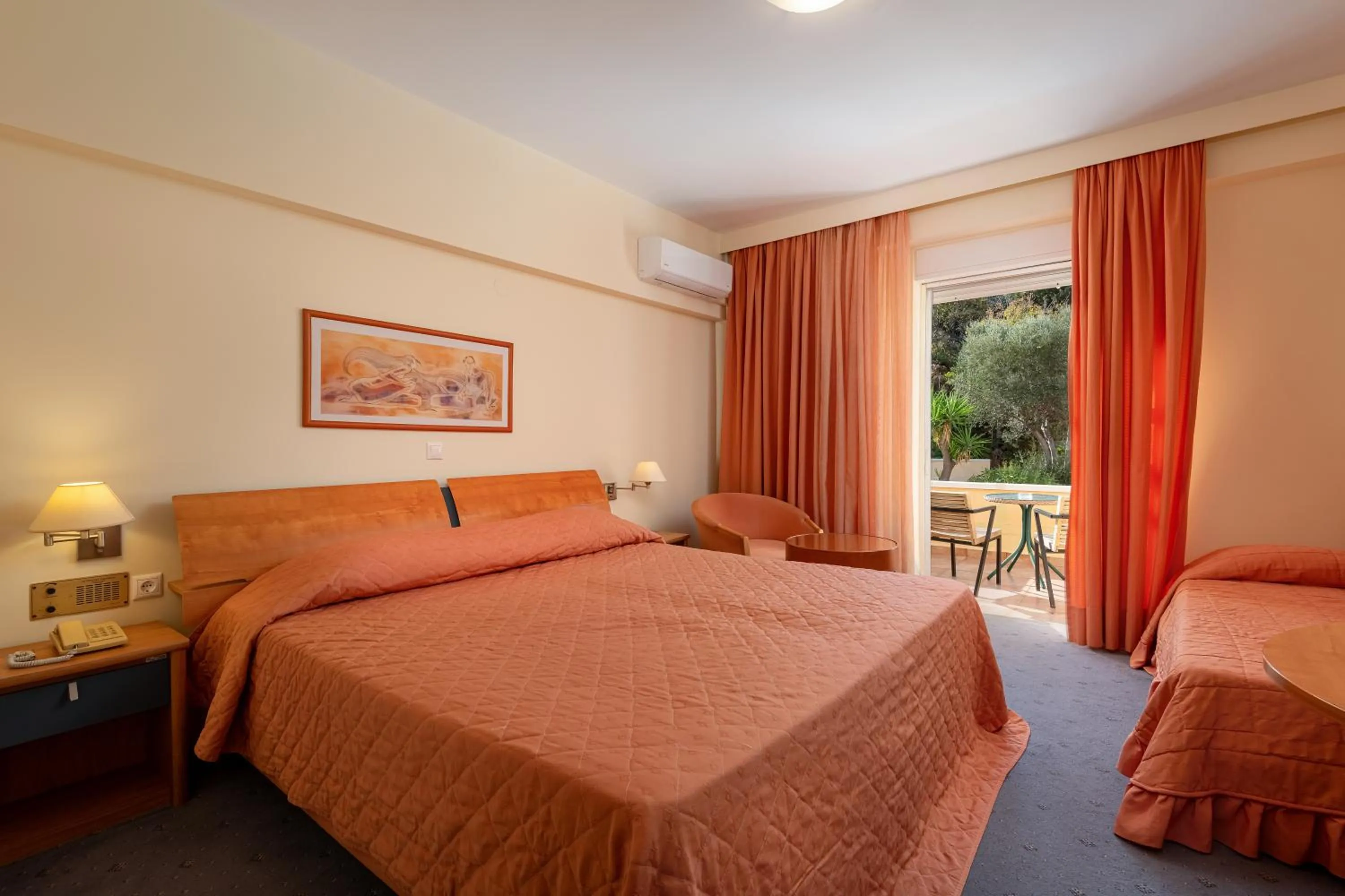 Bed in Crithoni's Paradise Hotel