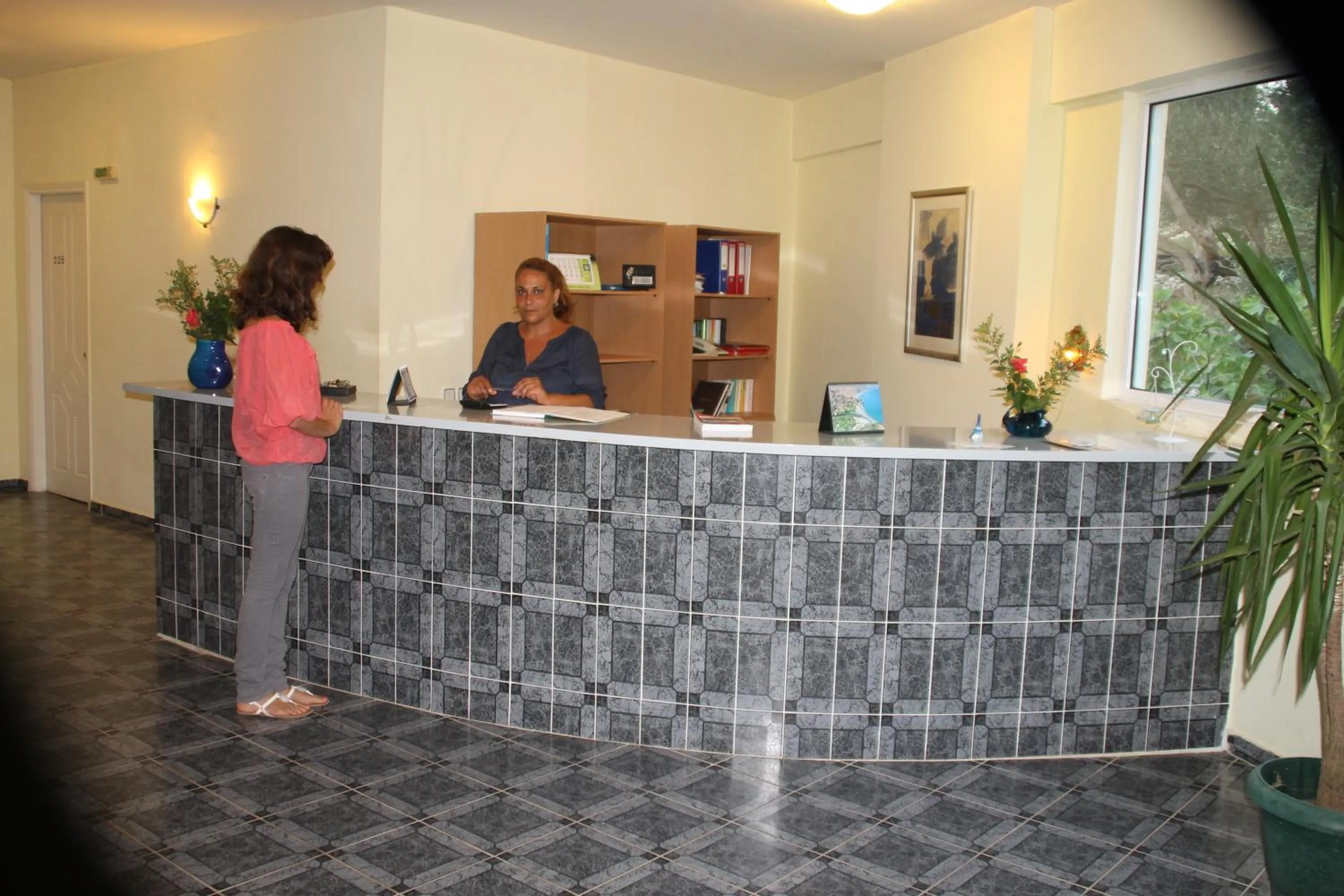Lobby or reception in Amfitriti Hotel & Studios