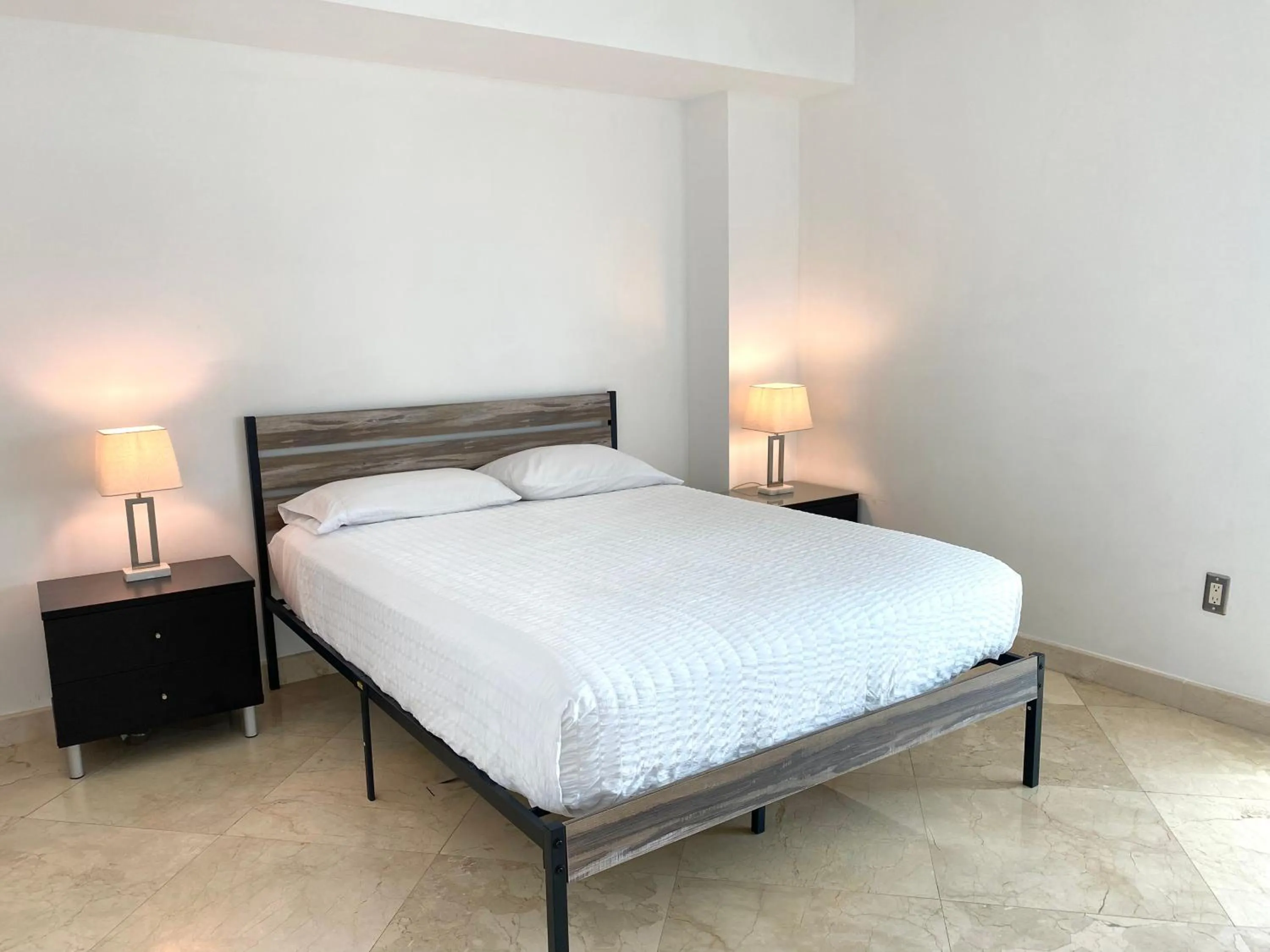 Bed in The King David Condos