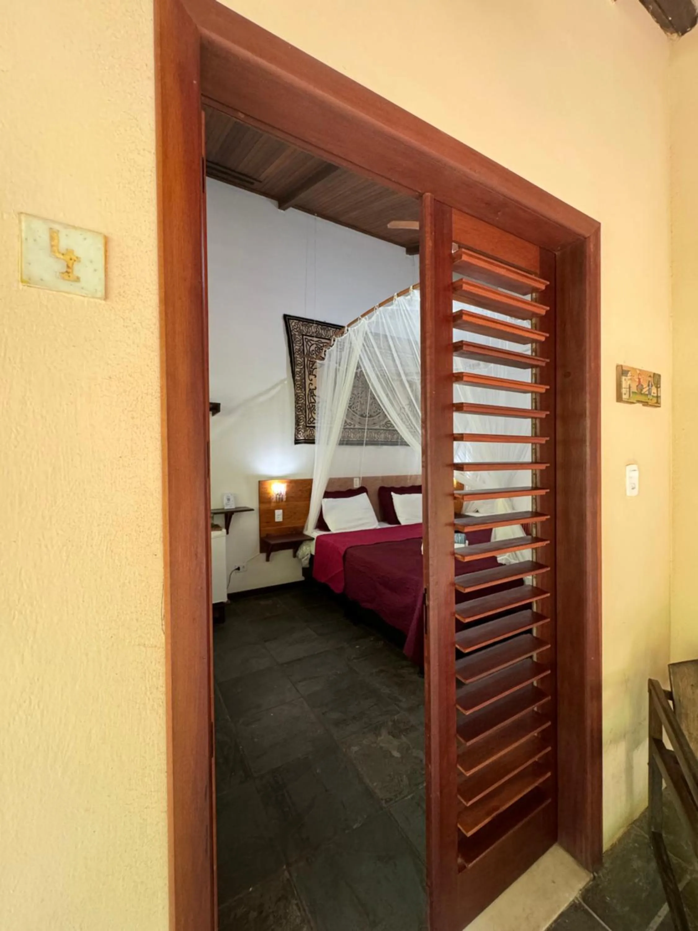 Facade/entrance, Bed in Pousada Horizonte Azul
