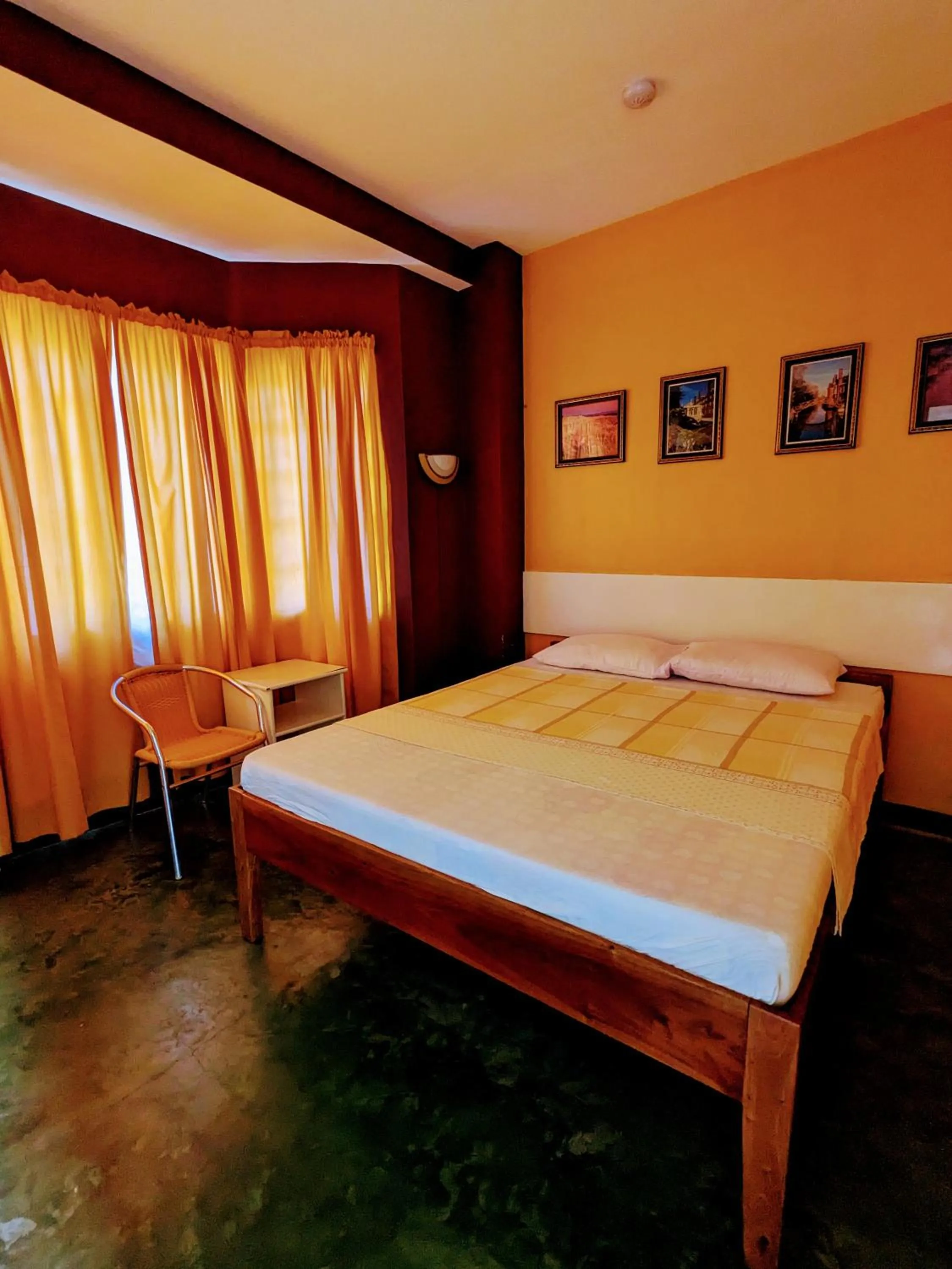 Bed in Citadel Alona Inn