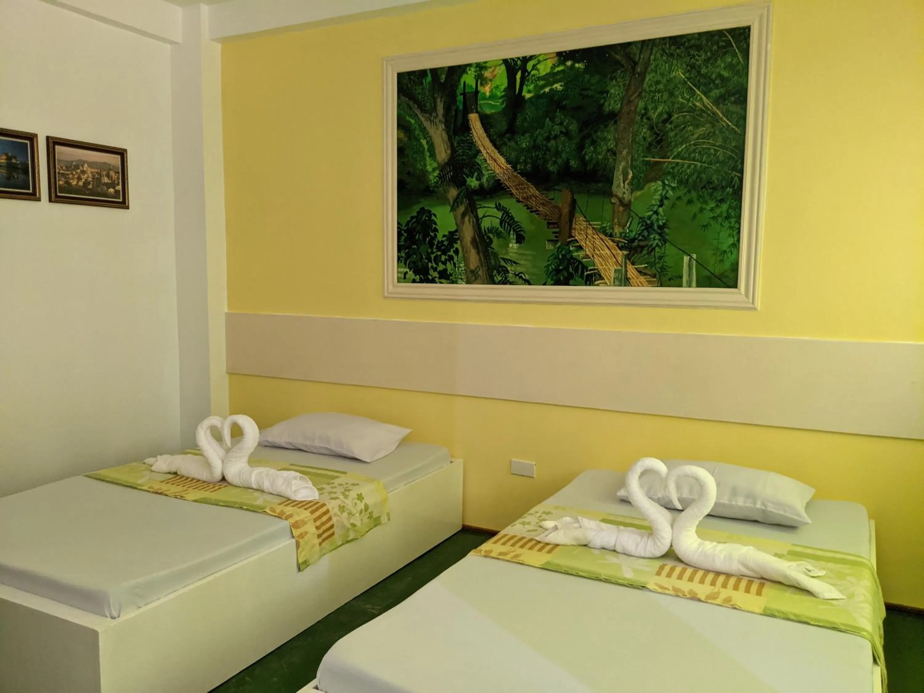 Bed in Citadel Alona Inn