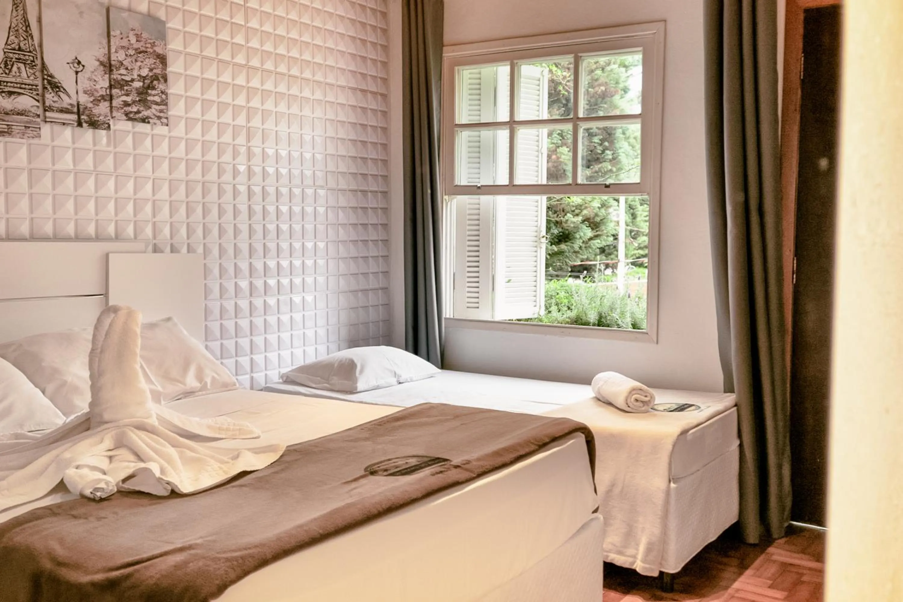 Bed in VELINN Pousada Casa de Campos Capivari House