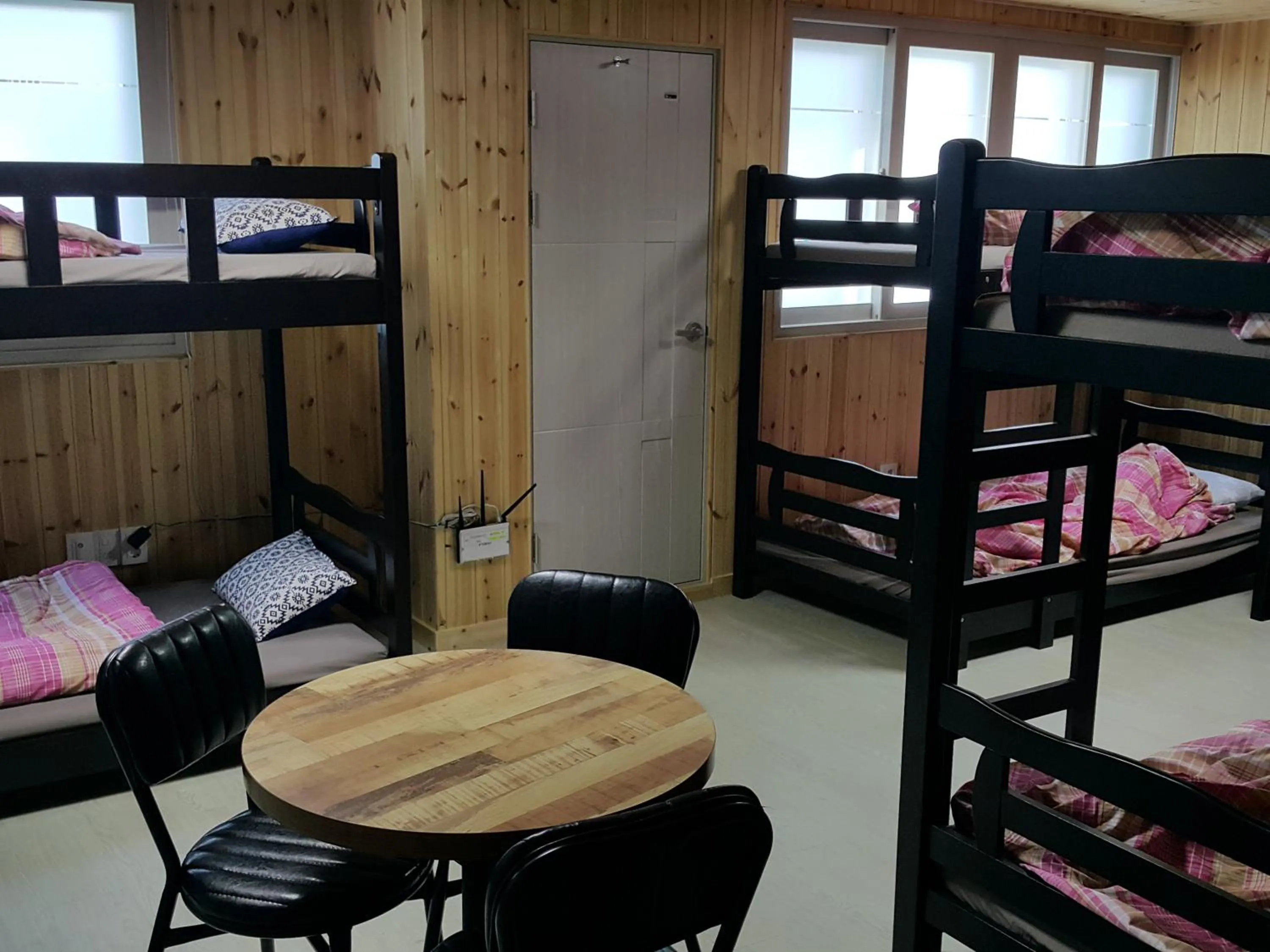 Seating area, Bed in Guest House Manna