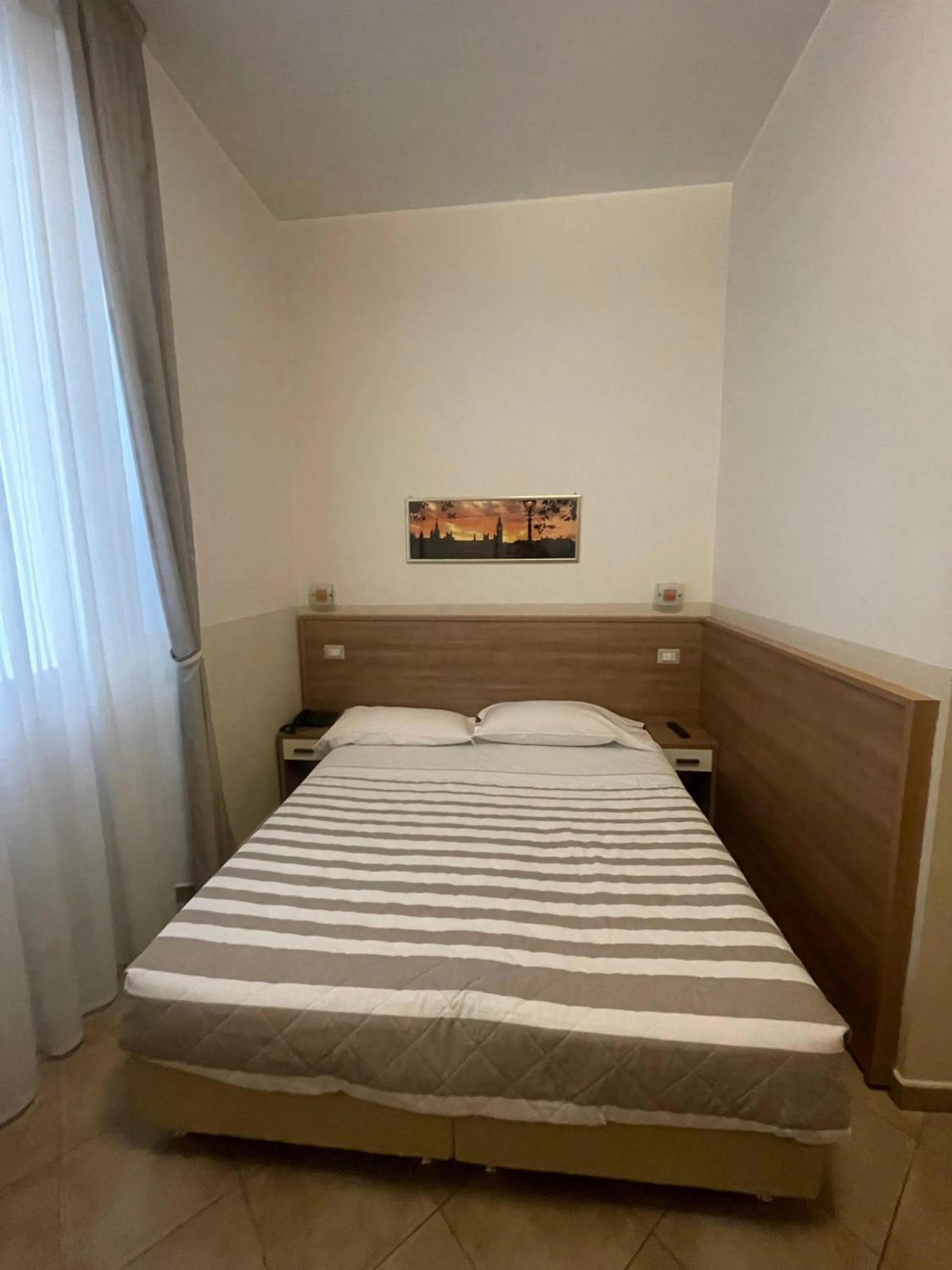 Bed in Hotel Montecarlo