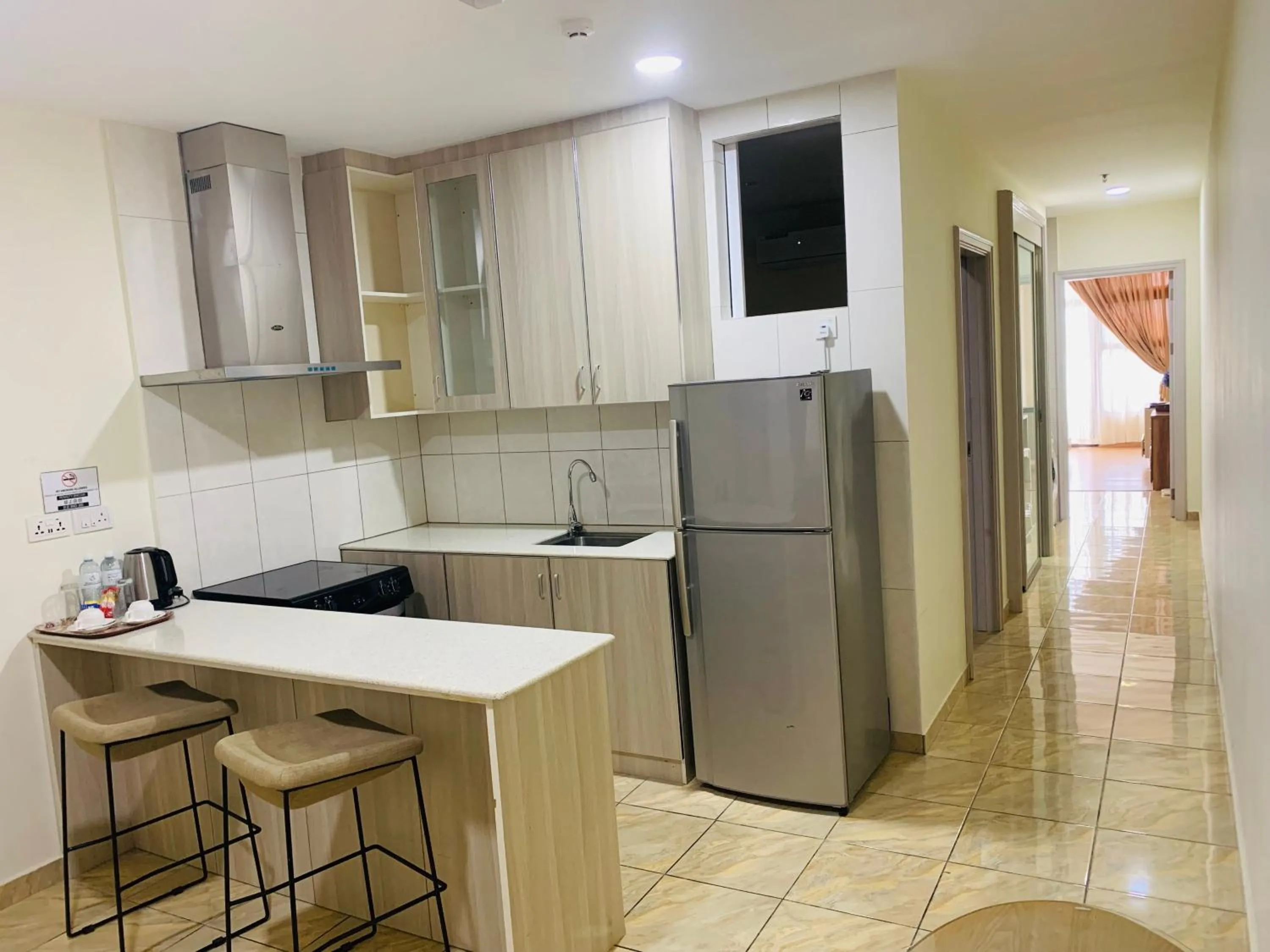 Kitchen or kitchenette in Wafa Hotel & Apartment