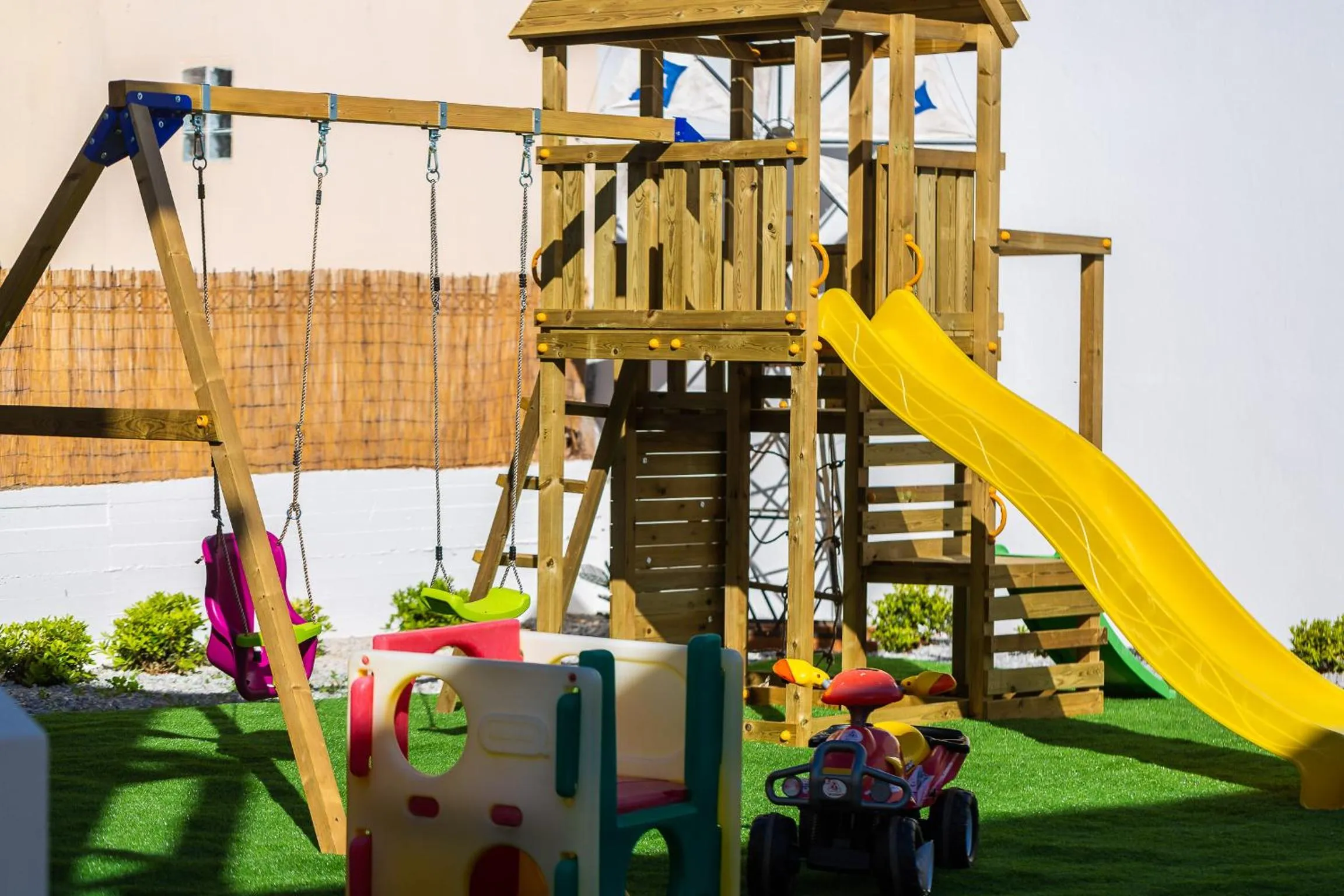 Children play ground in Nostos Beach Boutique Hotel