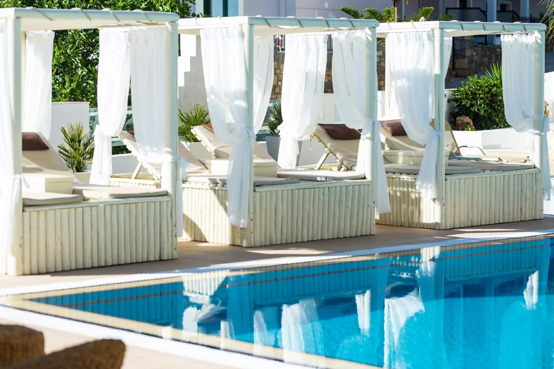 Swimming pool in Nostos Beach Boutique Hotel
