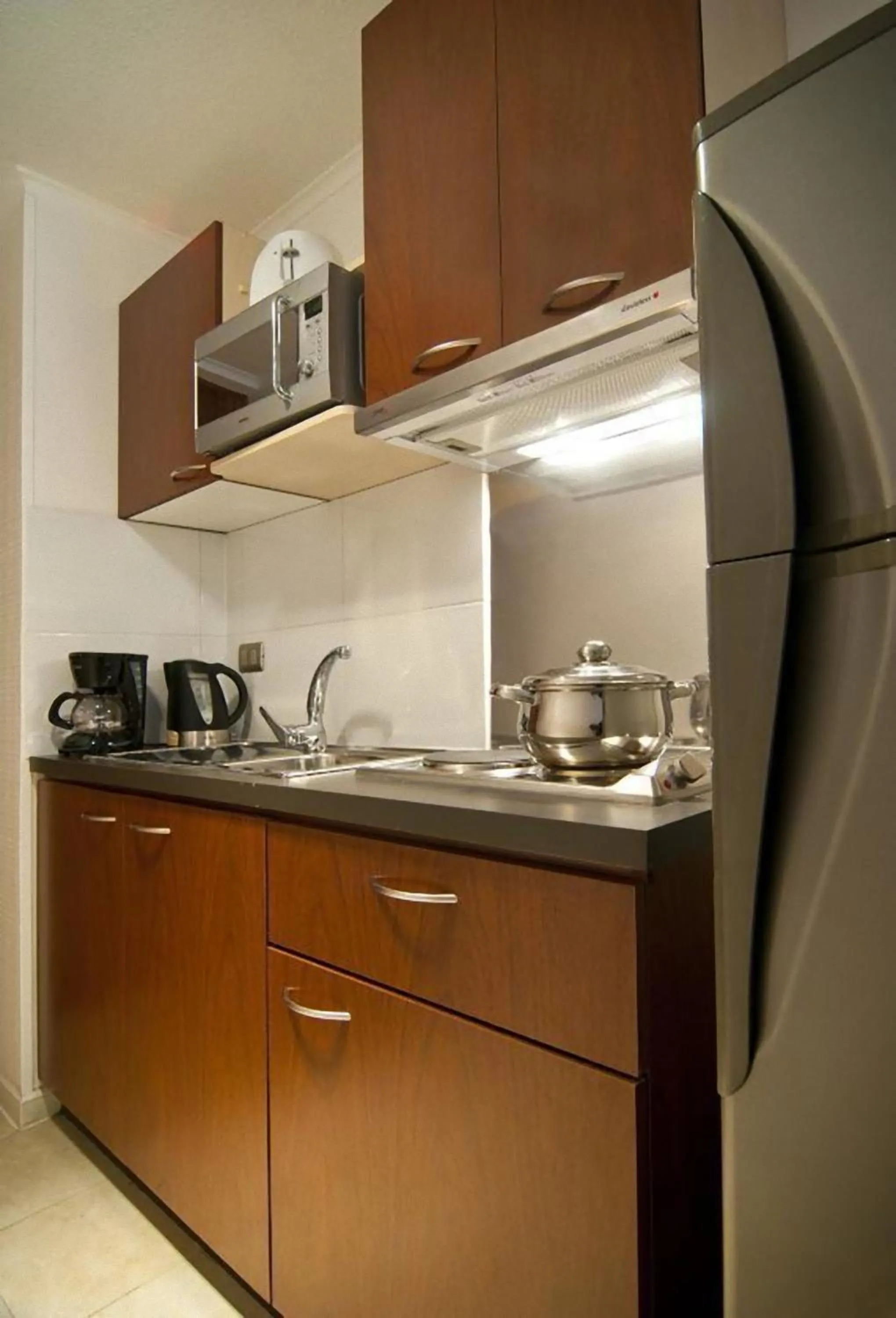 Kitchen or kitchenette in Park Plaza Apart Hotel