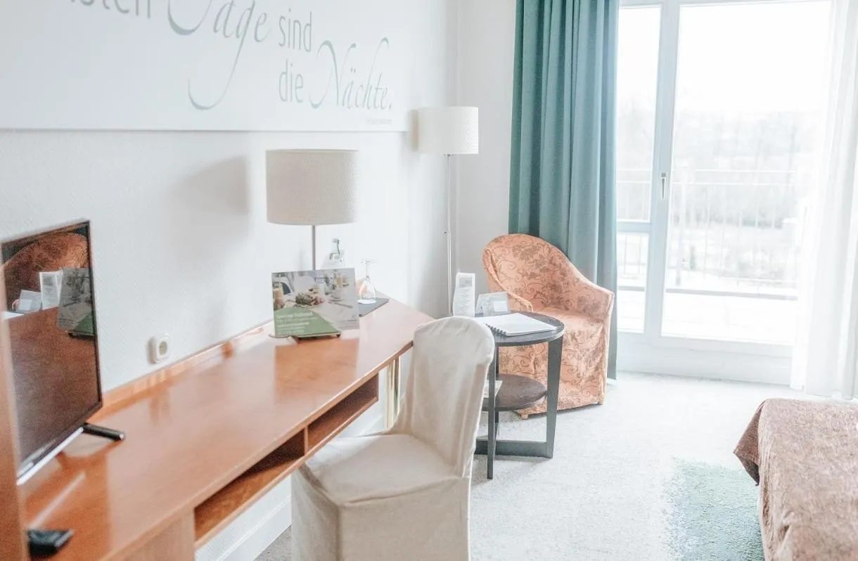 Photo of the whole room, Bed in Landhotel Rügheim