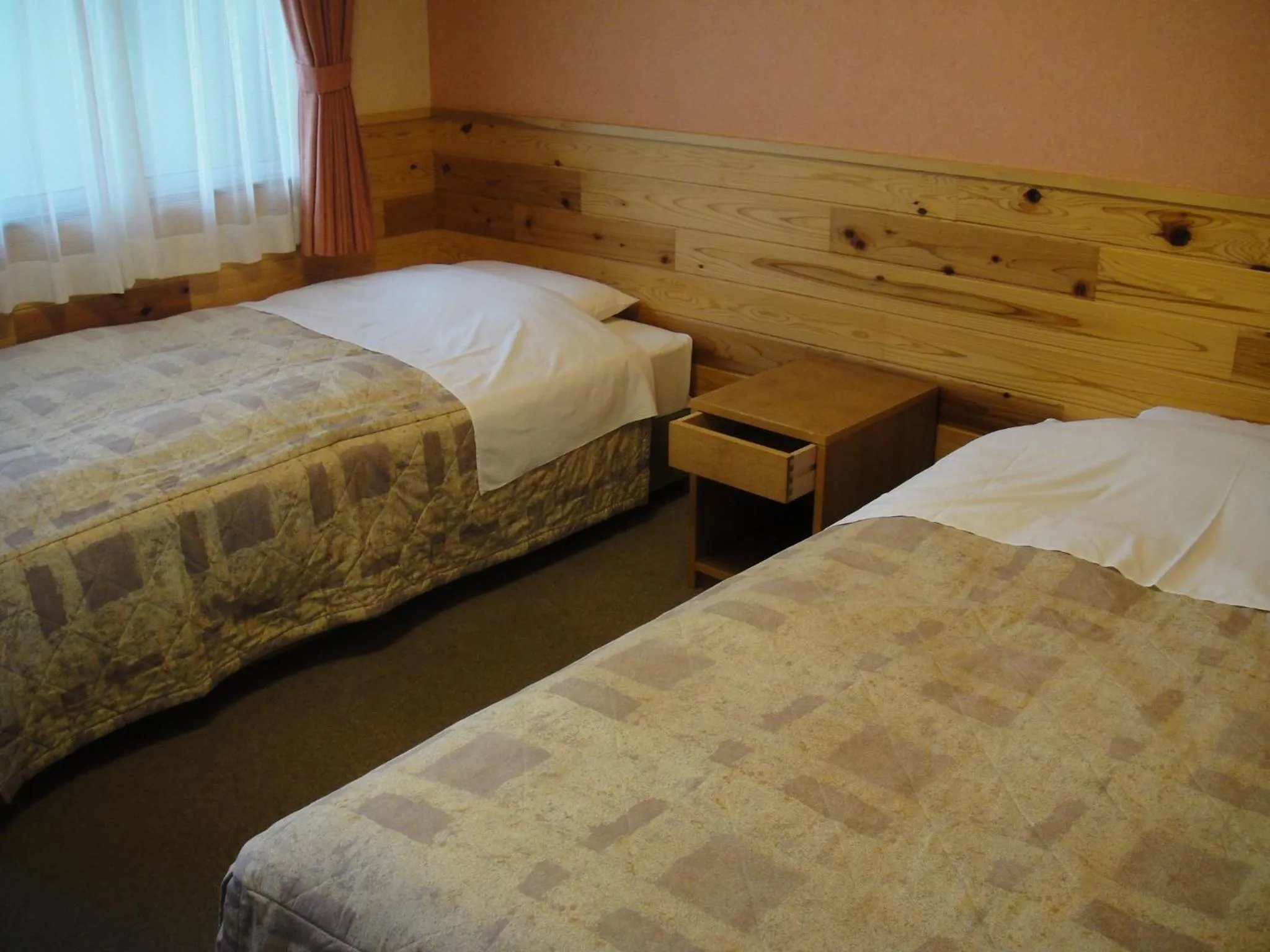 Bed in Turtle Inn Nikko