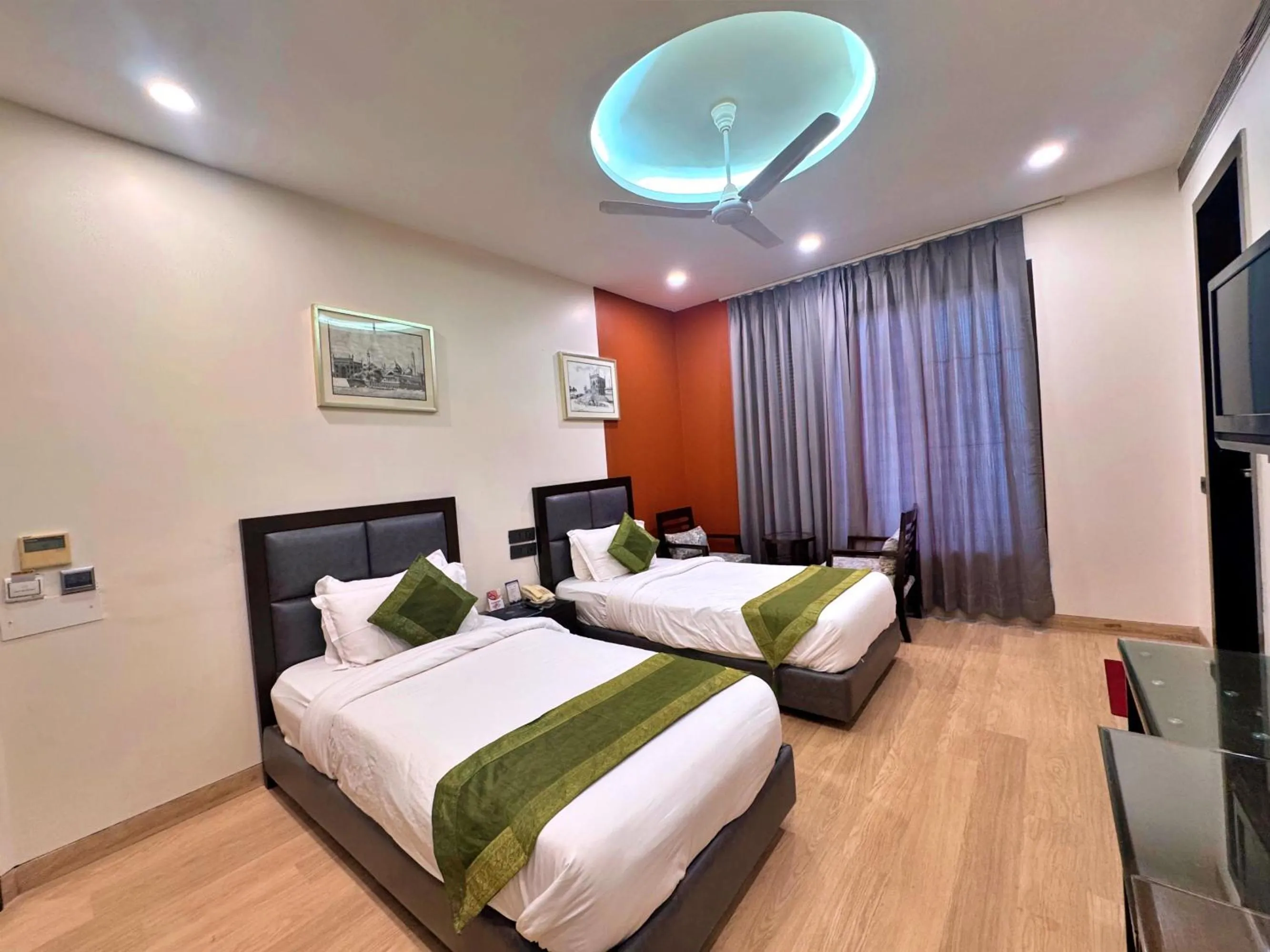 Bed in Amber Inn by Orion Hotels