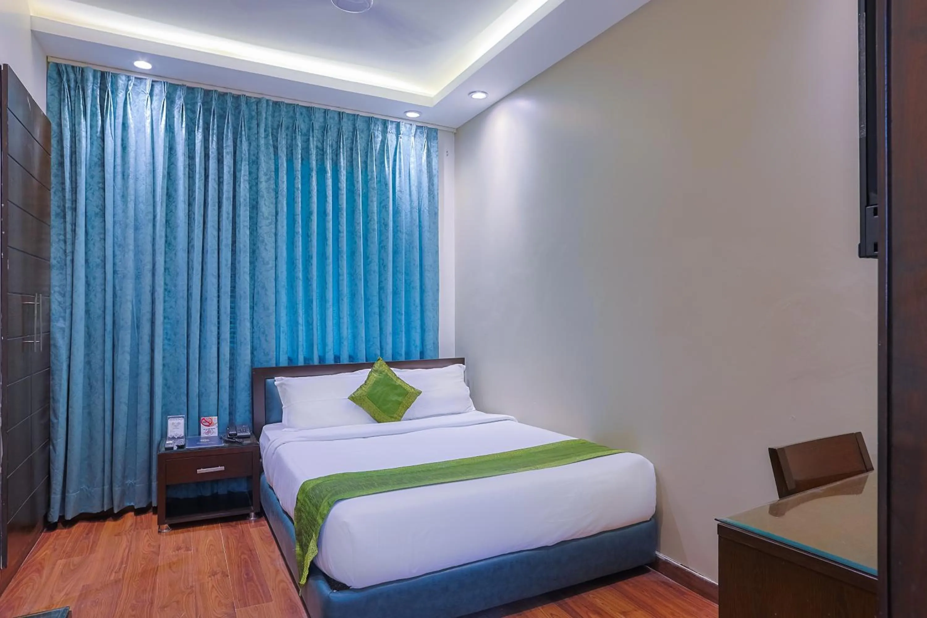 Bed in Amber Inn by Orion Hotels