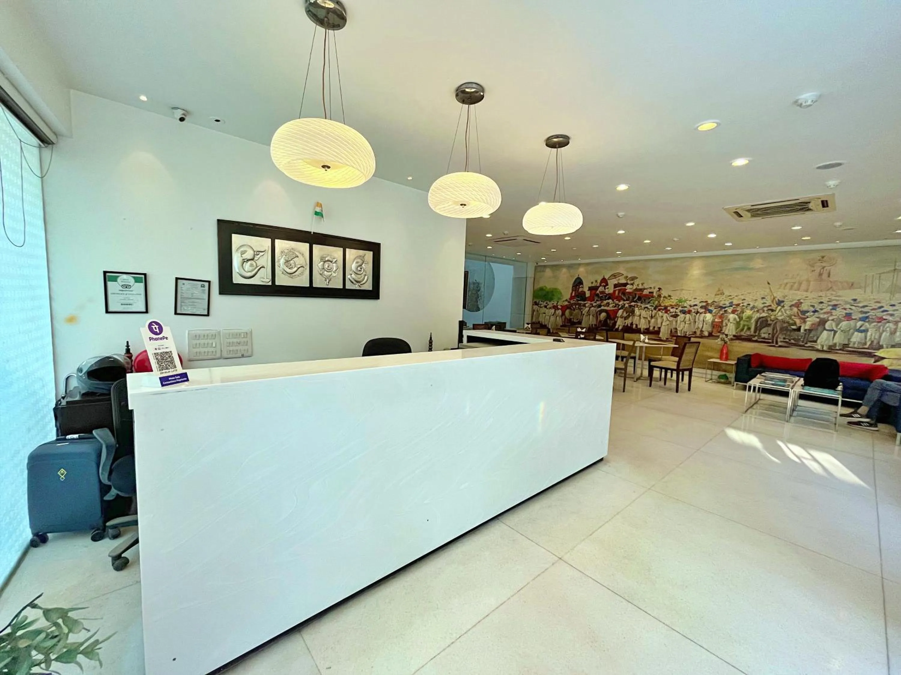 Lobby or reception in Amber Inn by Orion Hotels