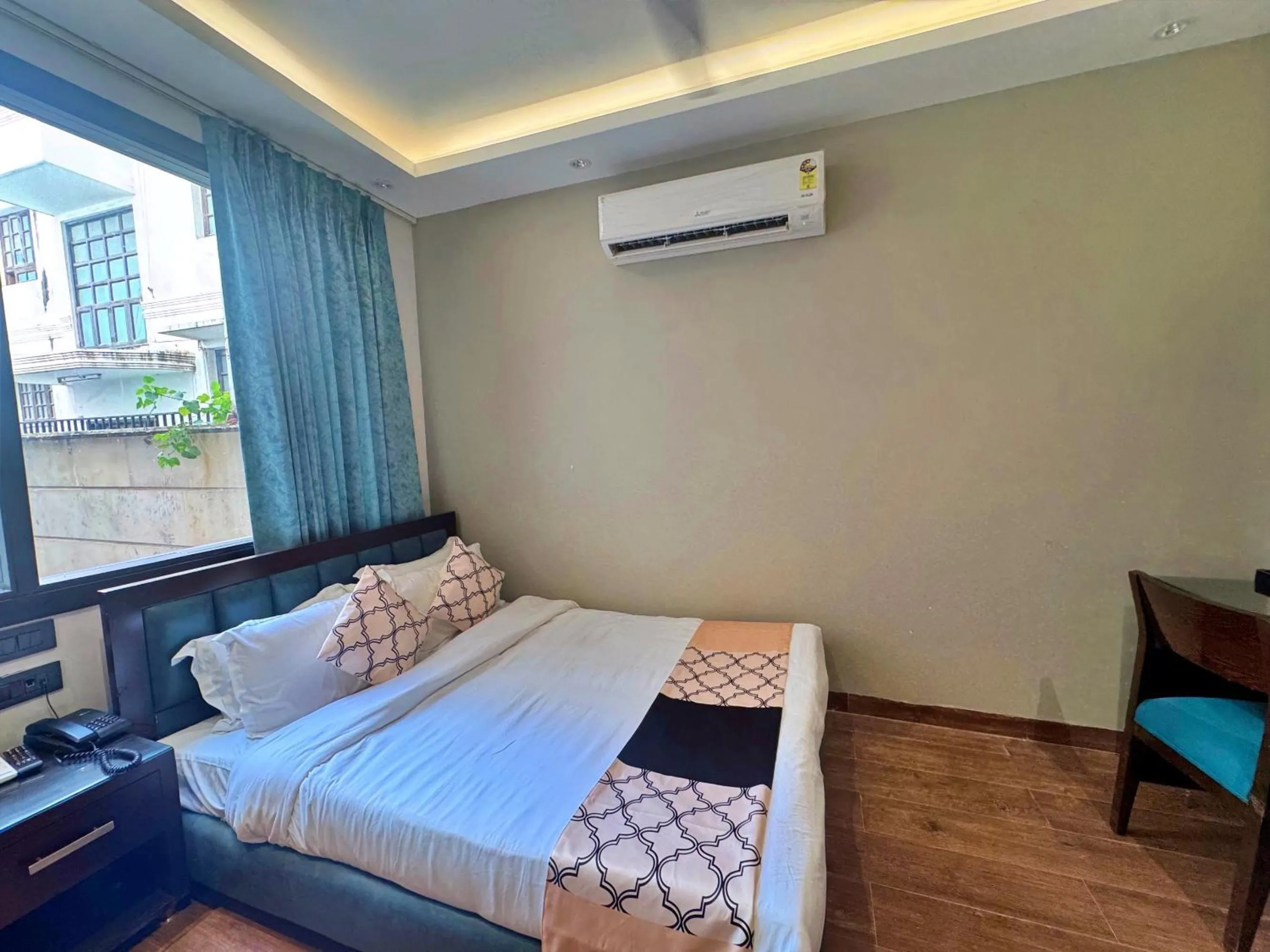 Bed in Amber Inn by Orion Hotels