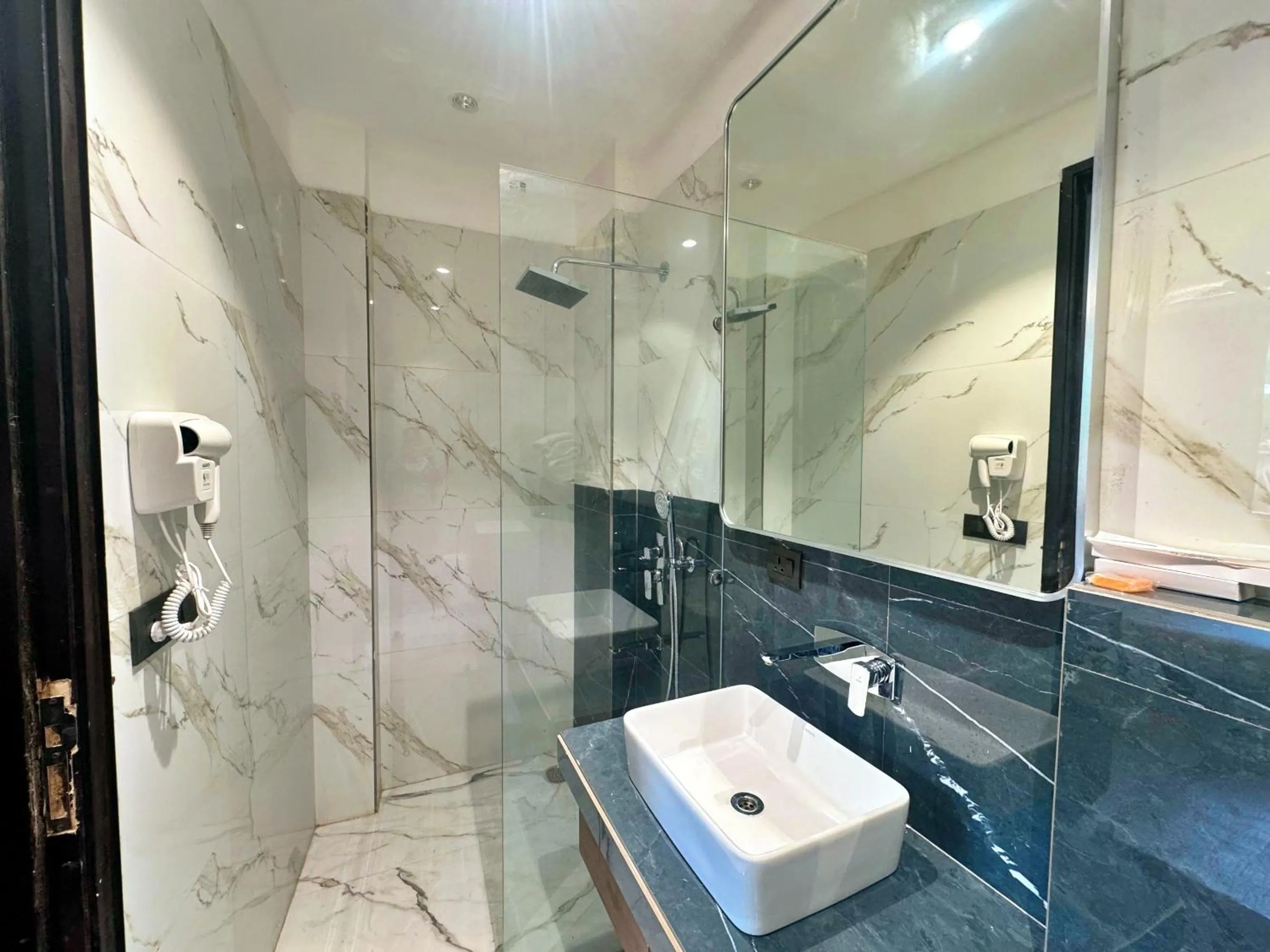 Toilet in Amber Inn by Orion Hotels