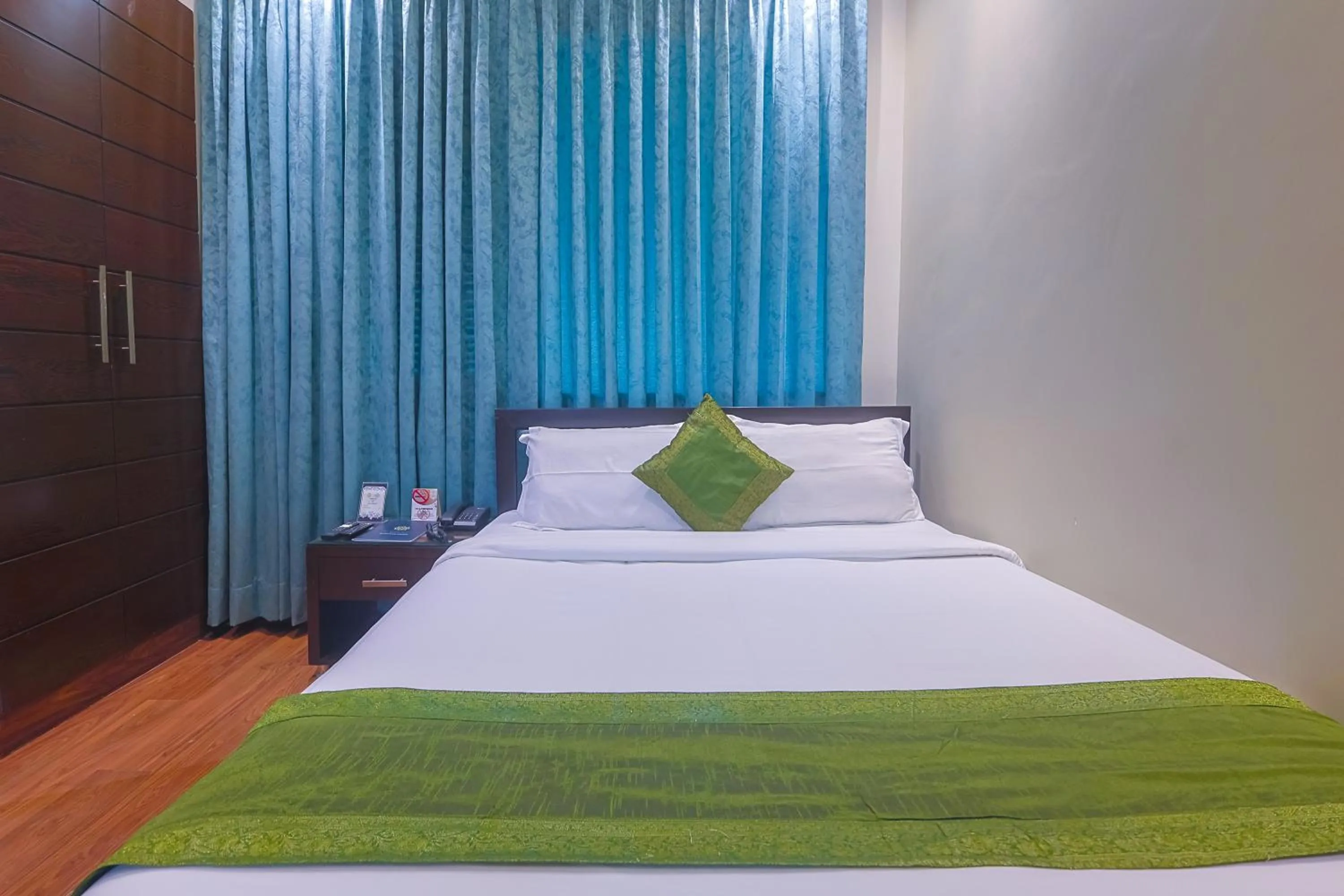 Bed in Amber Inn by Orion Hotels
