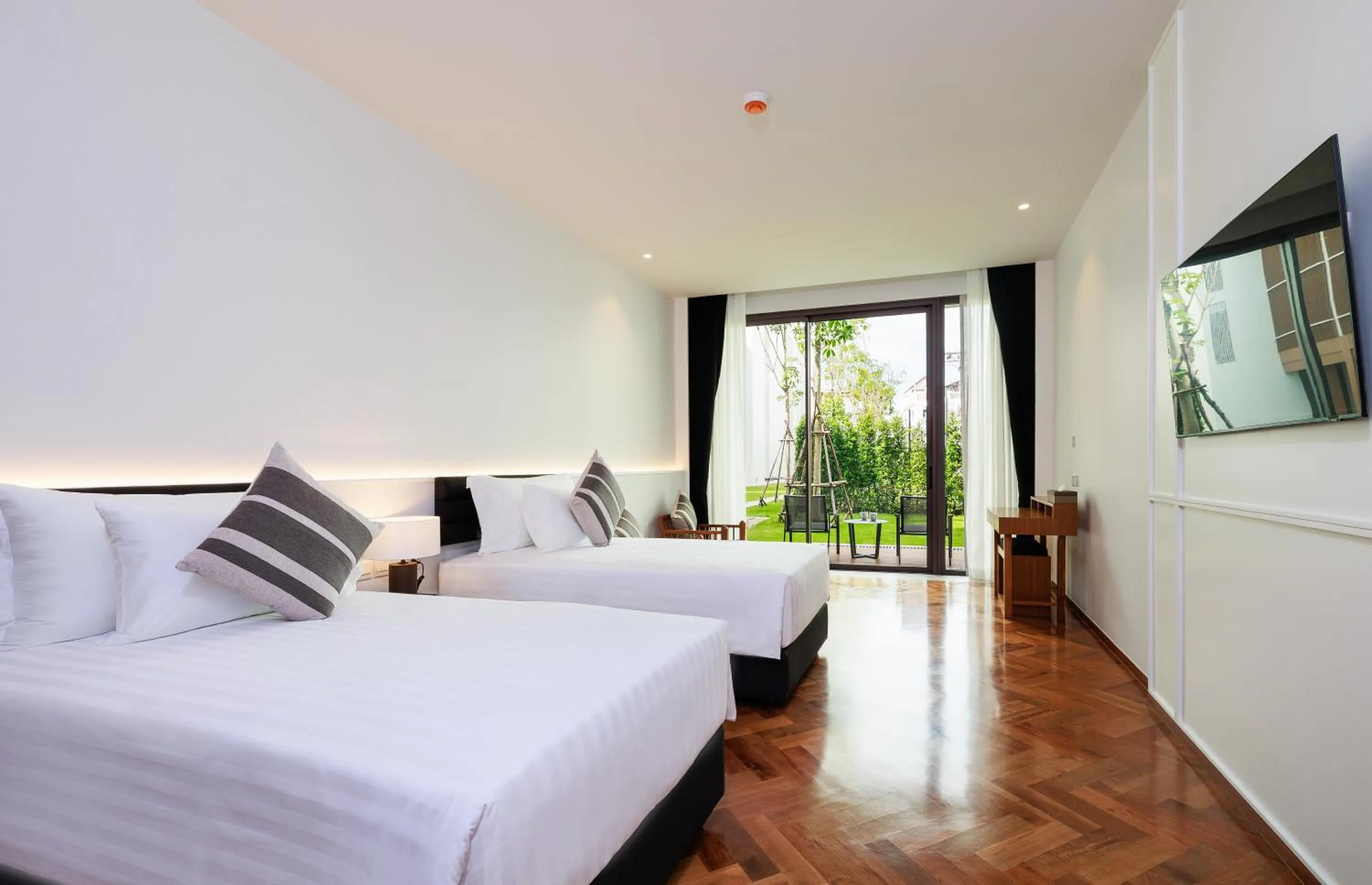 Bed in Patong Beach Hotel by See2Sea