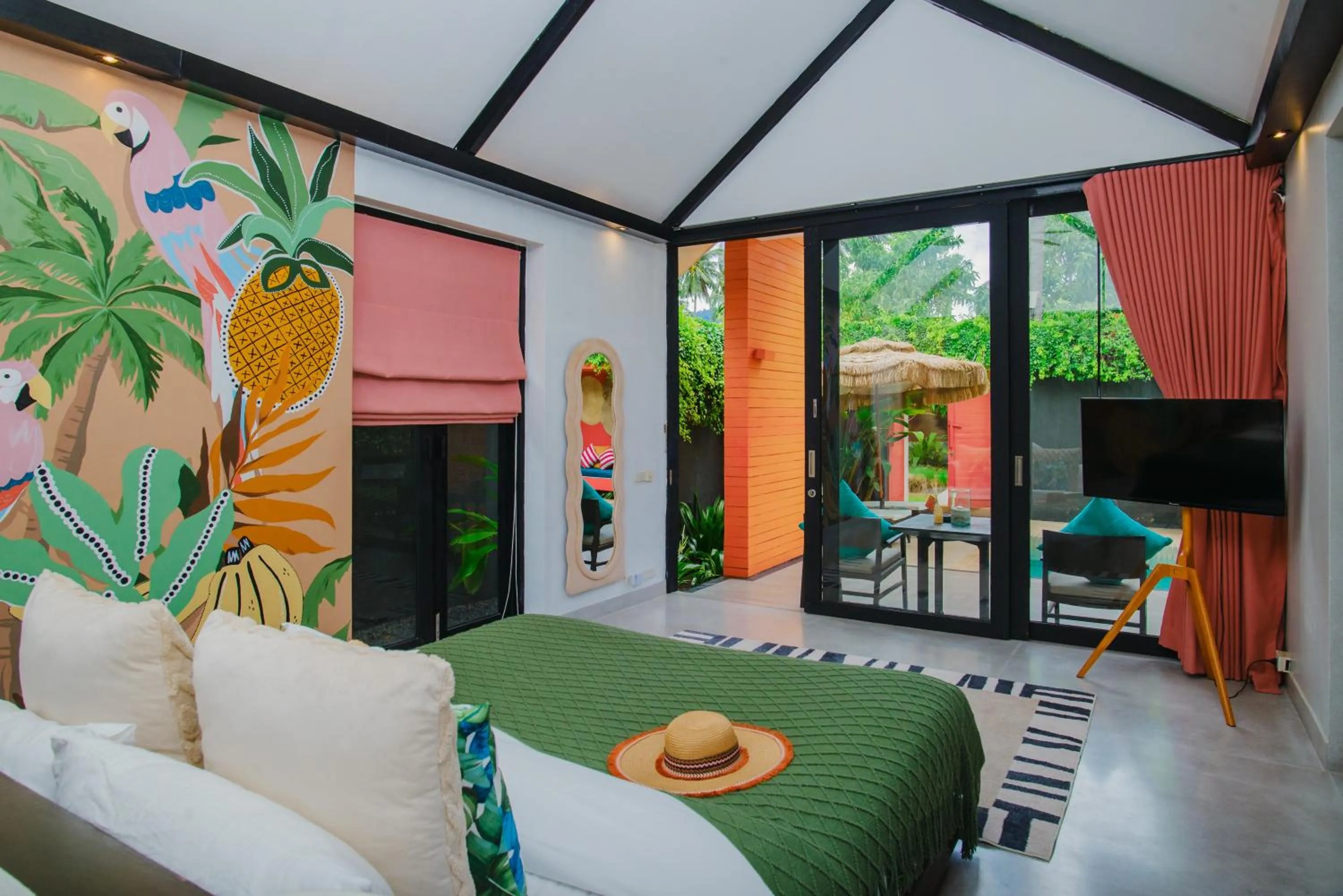 Communal lounge/ TV room, Bed in Tolani Resort Koh Samui