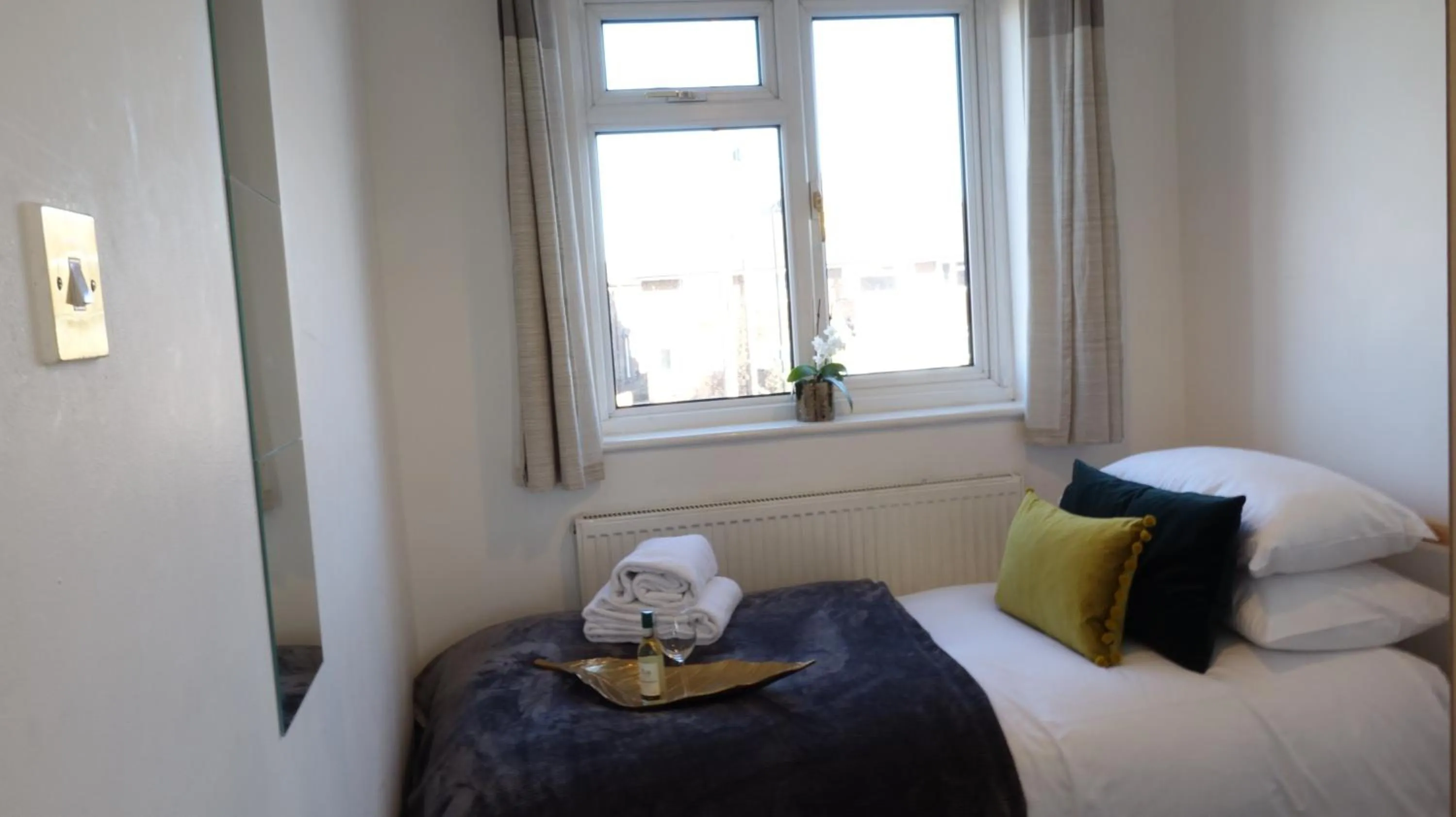 Bedroom in Airport Garden Rooms